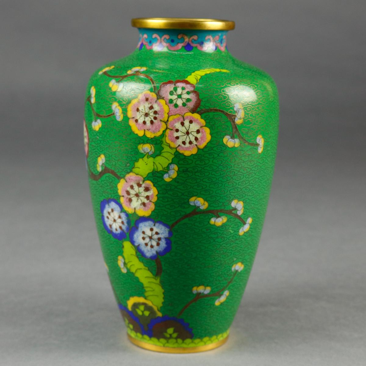 A vintage Chinese cloisonné vase offers brass construction with hand enameled floral decoration with repeating stylized foliate bands at base and collar, circa 1930

***DELIVERY NOTICE – Due to COVID-19 we are employing NO-CONTACT PRACTICES in the
