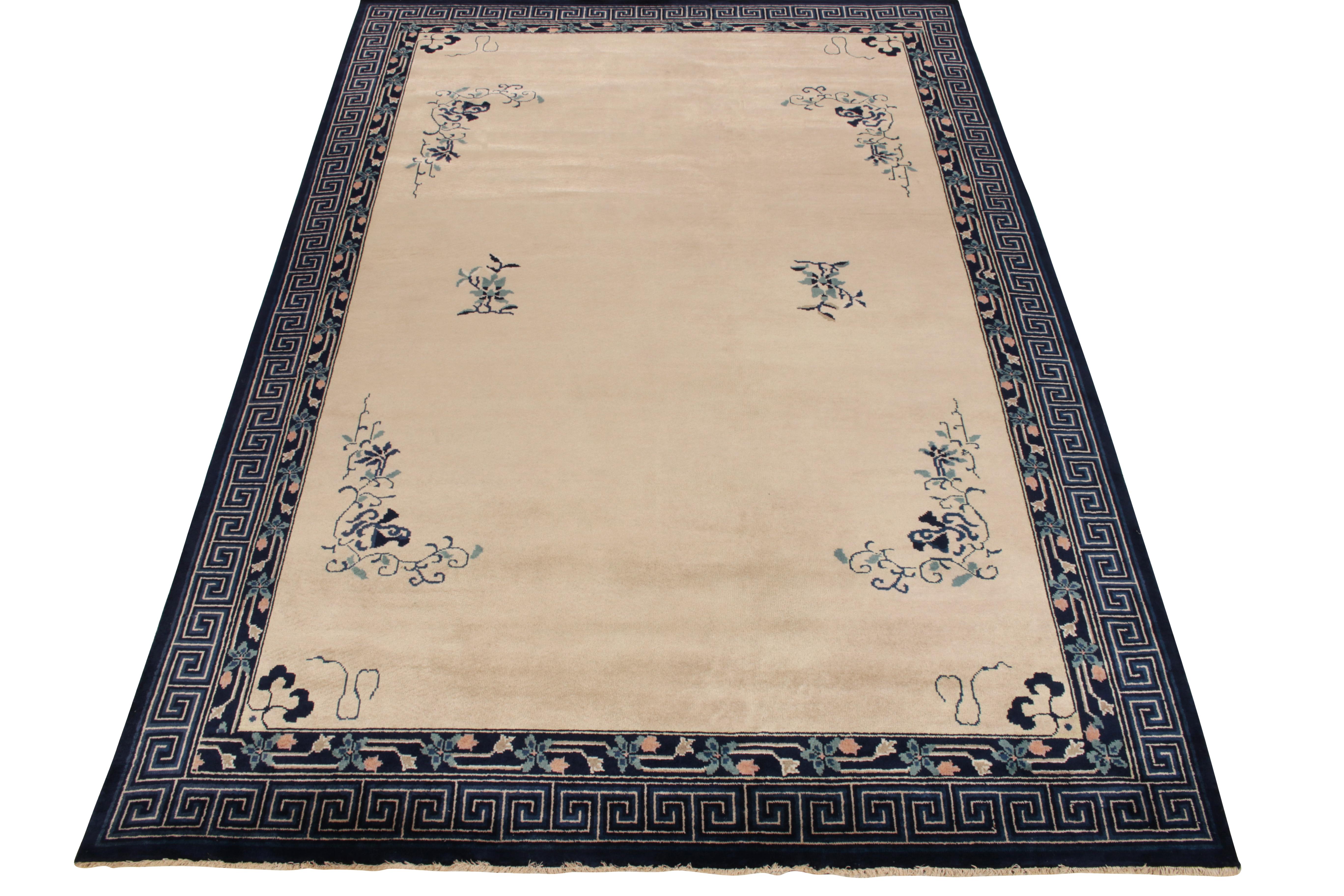 Encased in a Greek key border & floral designs in deep blue, beige & peach, this 1920s style rug enjoys Chinese Art Deco inspiration, connoting a distinctive vintage line newly unveiled from our Deco patterns. Mild light and dark spots on a biscuit