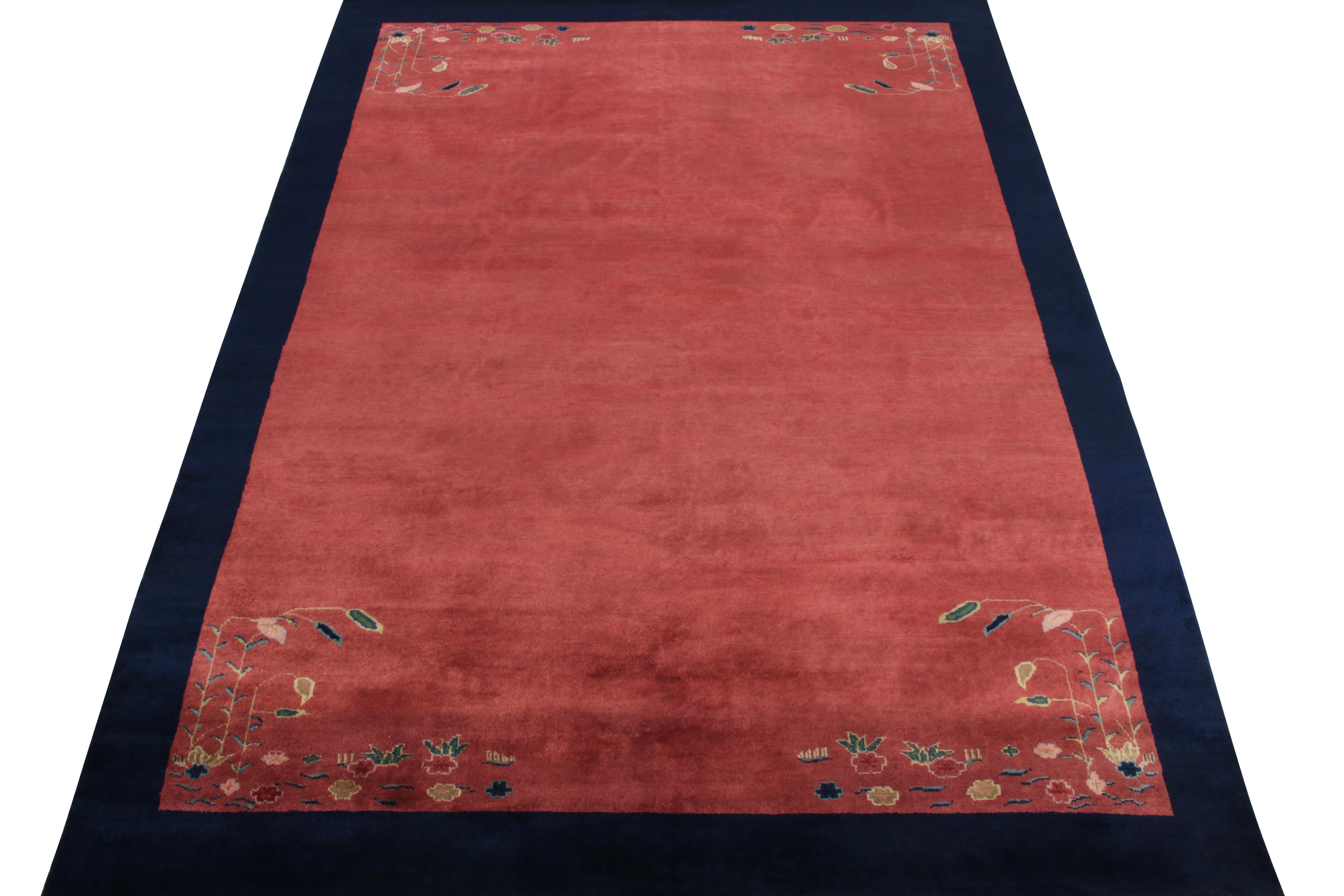 Hand-knotted in wool, a 7 x 10 ode to Chinese art deco rugs from our Antique & Vintage collection bearing classic sensibilities of the 1920s. This vintage rug enjoys a healthy pile in coral red with mild light and dark spots on the field for a