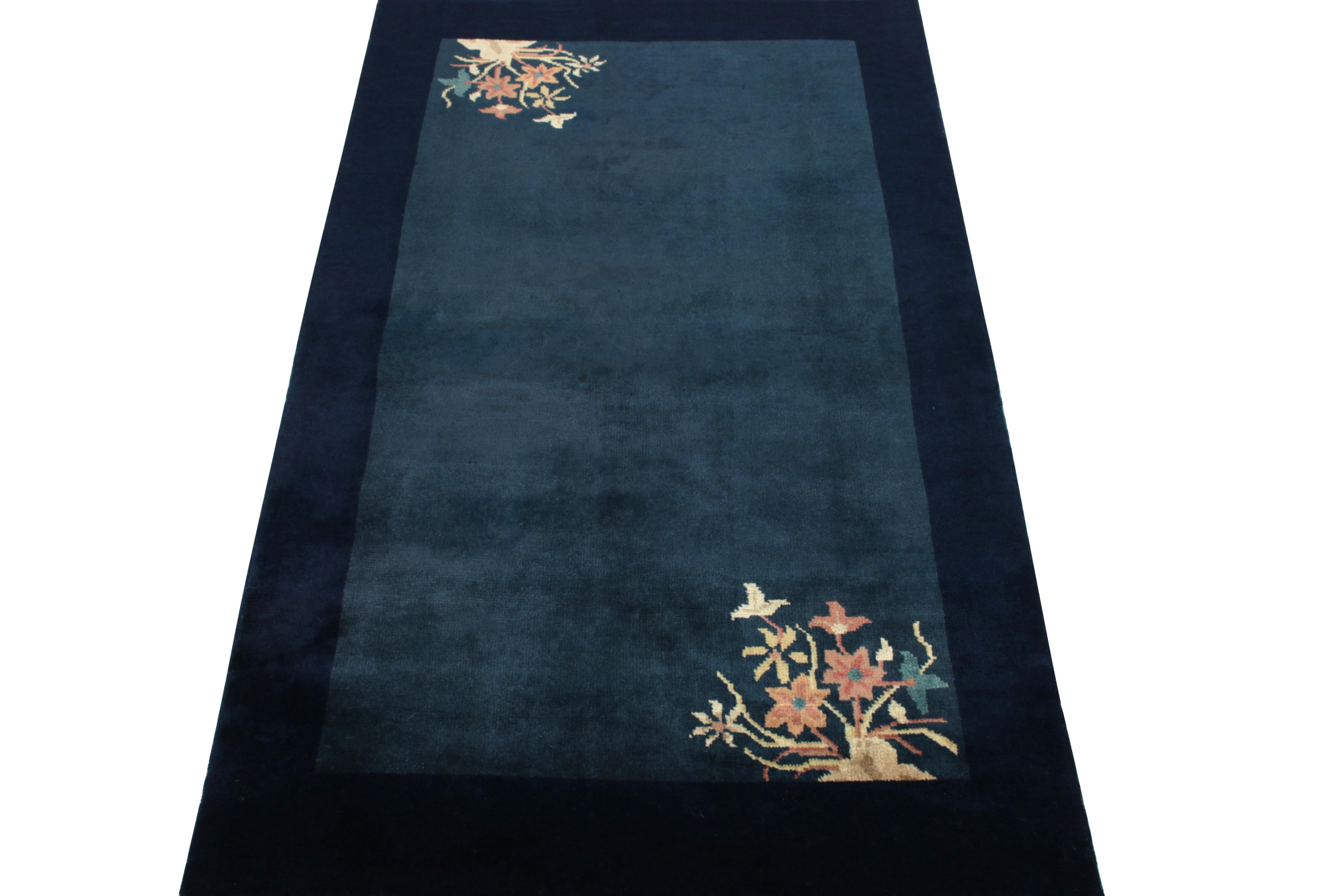 Inspired by the venerated 1920s style, this 3x3 vintage ode to Chinese art deco rugs features flowers flourishing in teal, tangerine-red, yellow tones in diagonal corners of the inner border highlighting the minimalist approach in design. Subtly