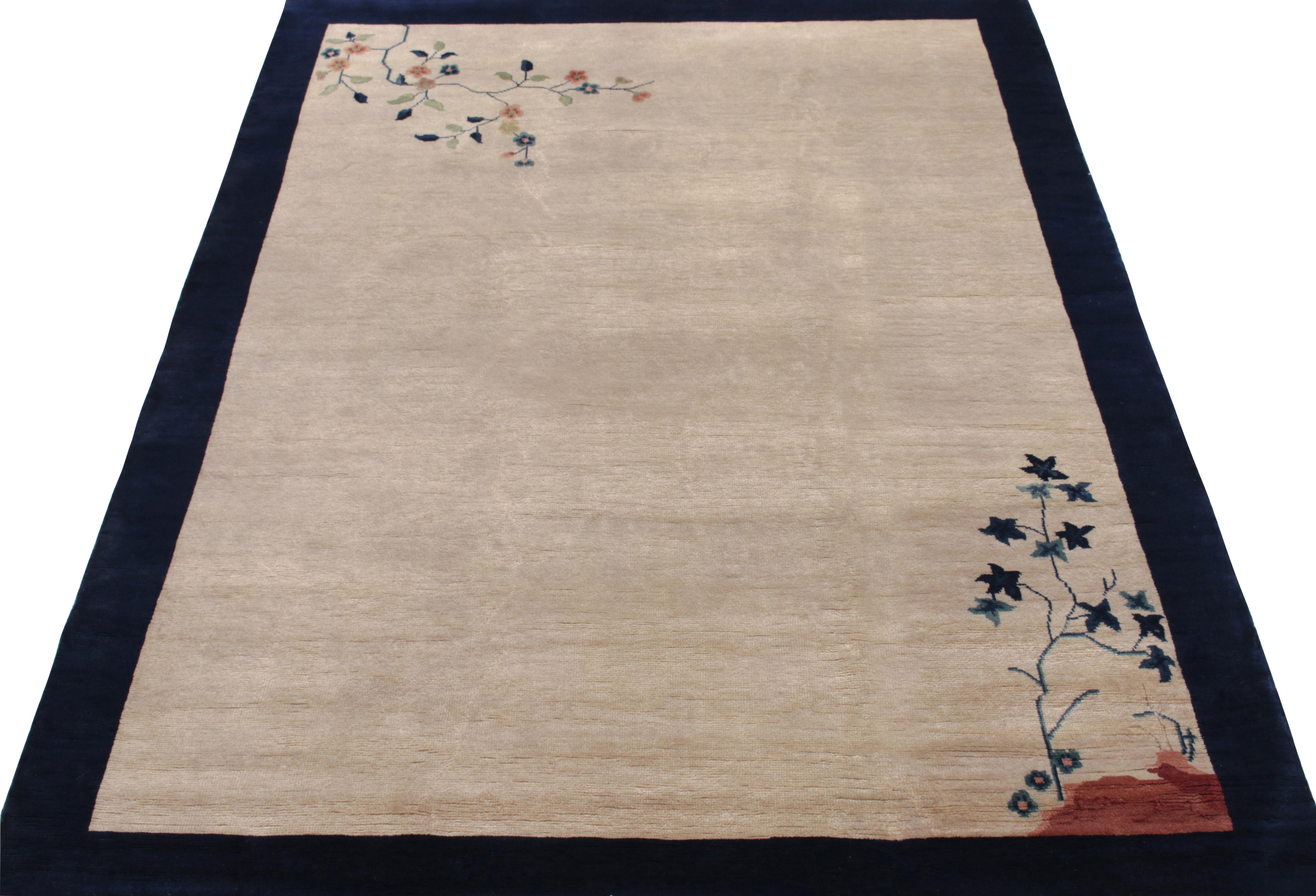 Signalling the beauty in minimalist Oriental style, this vintage 6x7 ode to Chinese art deco rugs of the 1920s features tender flower-bearing branches stooping down alluding to floral imagery on the ground. A gentle representation of garden themes