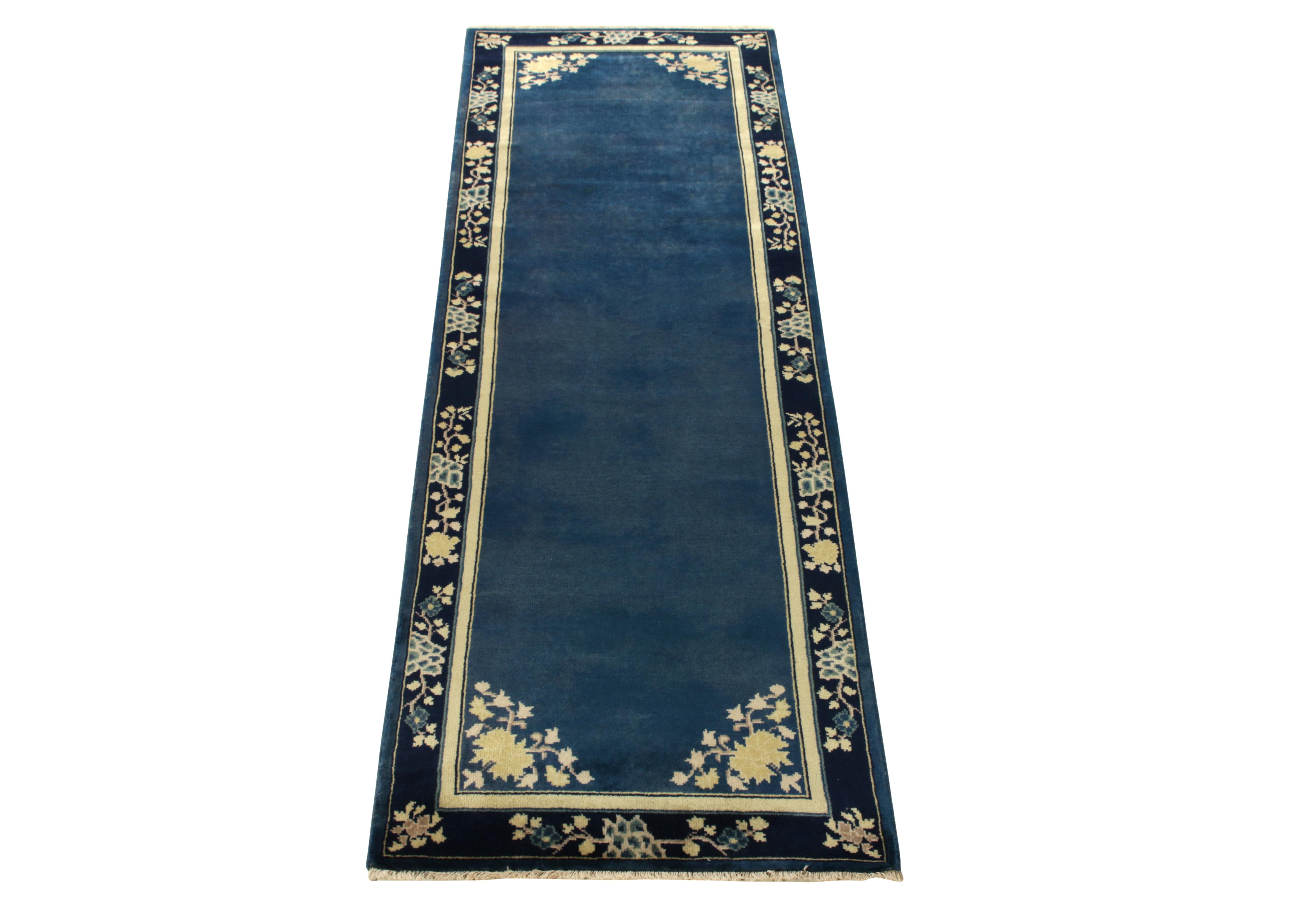 A 3x8 handknotted piece connoting Chinese art deco sensibilities of the 1920s coming from Rug & Kilim’s Antique & Vintage collection. The clean blue open field enjoys light dark spots for an interesting visual appeal on scale further exalted by off