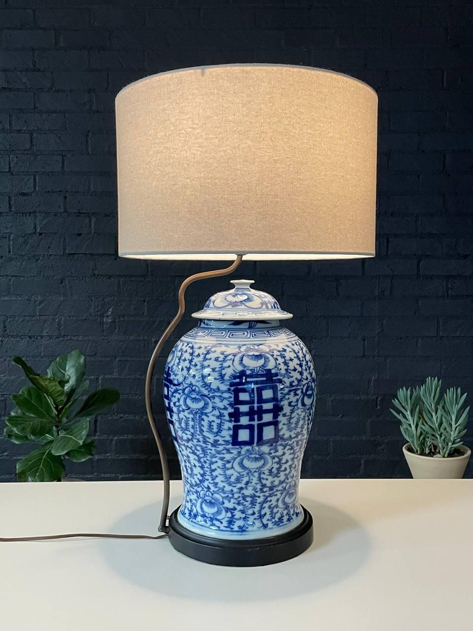 Materials: Carved Wood, Porcelain, Linen Shade
Style: Chinese Antique

Condition: Newly Rewired, New Linen Shade, One Minor Chip