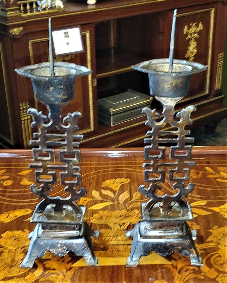 Presenting a lovely vintage Chinese double happiness wedding candlesticks, a matching pair.

Made in China in the early 20th century of bronzed pewter, with their original folded beehive wax candles.

Made circa 1930.

Made for the purpose of