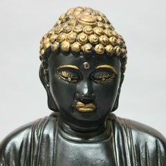 Vintage Indian Ebonized and Gilt Chalkware Gautama Buddha, 20th Century