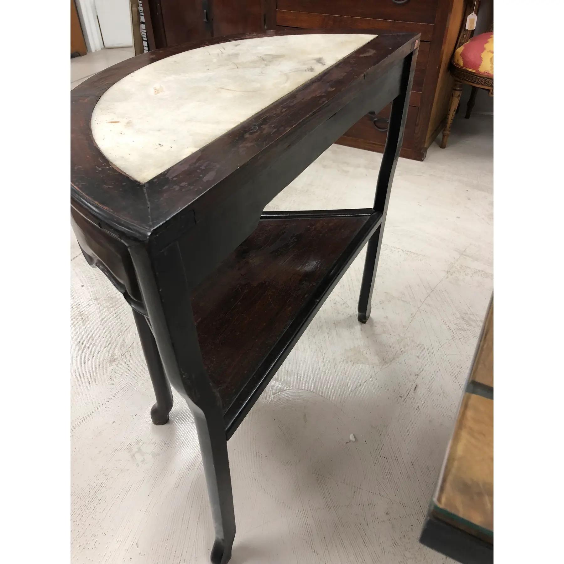 Vintage Chinese Elm Demi-Lune Marble Insert Console Table. Two tiered construction, top with a white marble insert.

Dimensions
33ʺW × 16ʺD × 33ʺH



