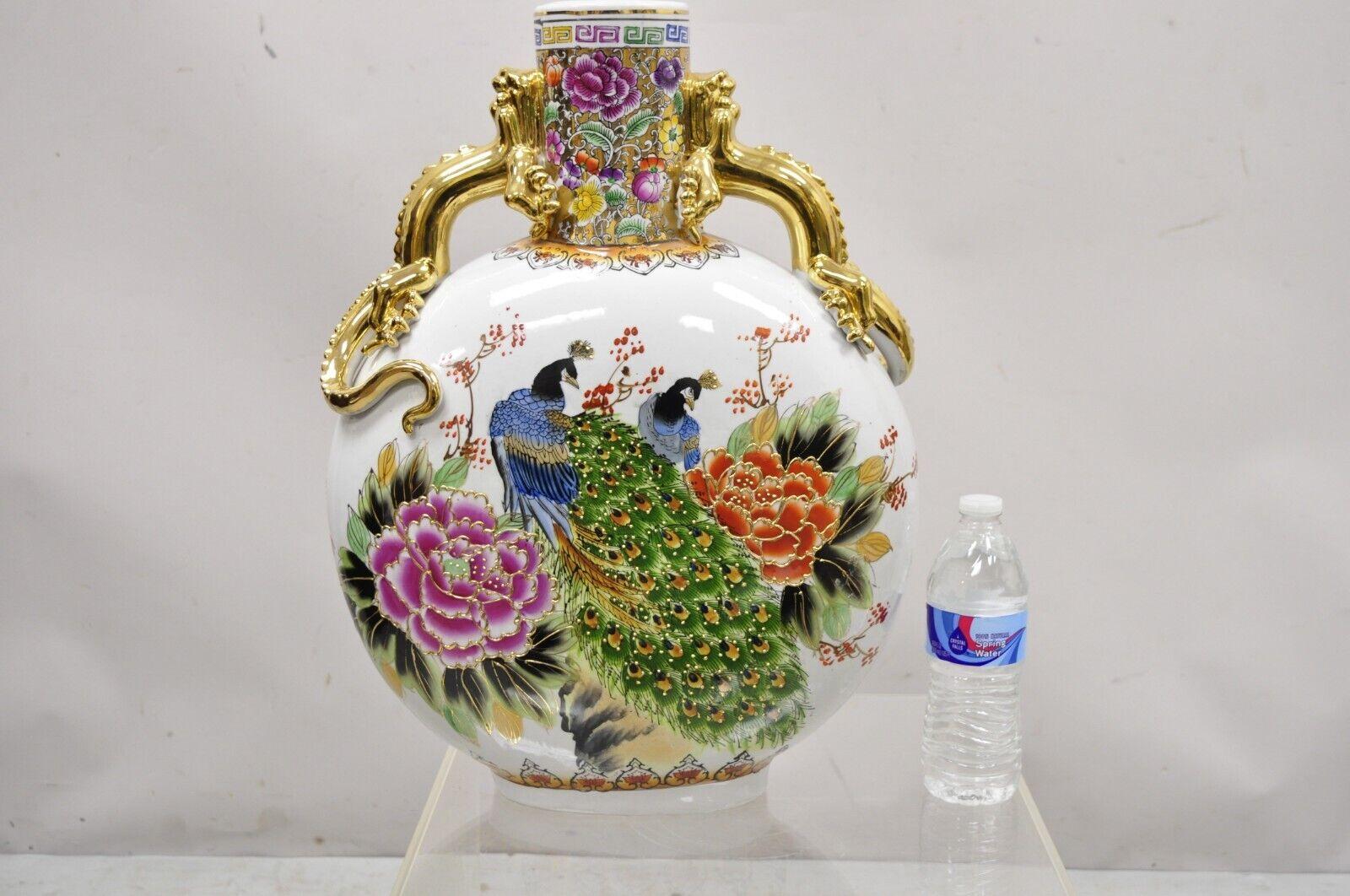 Vintage Chinese Famille Rose Porcelain Figural Orange Moon Flask vase with Dragons. Item features twin dragon handles, gold gilt details, figural 