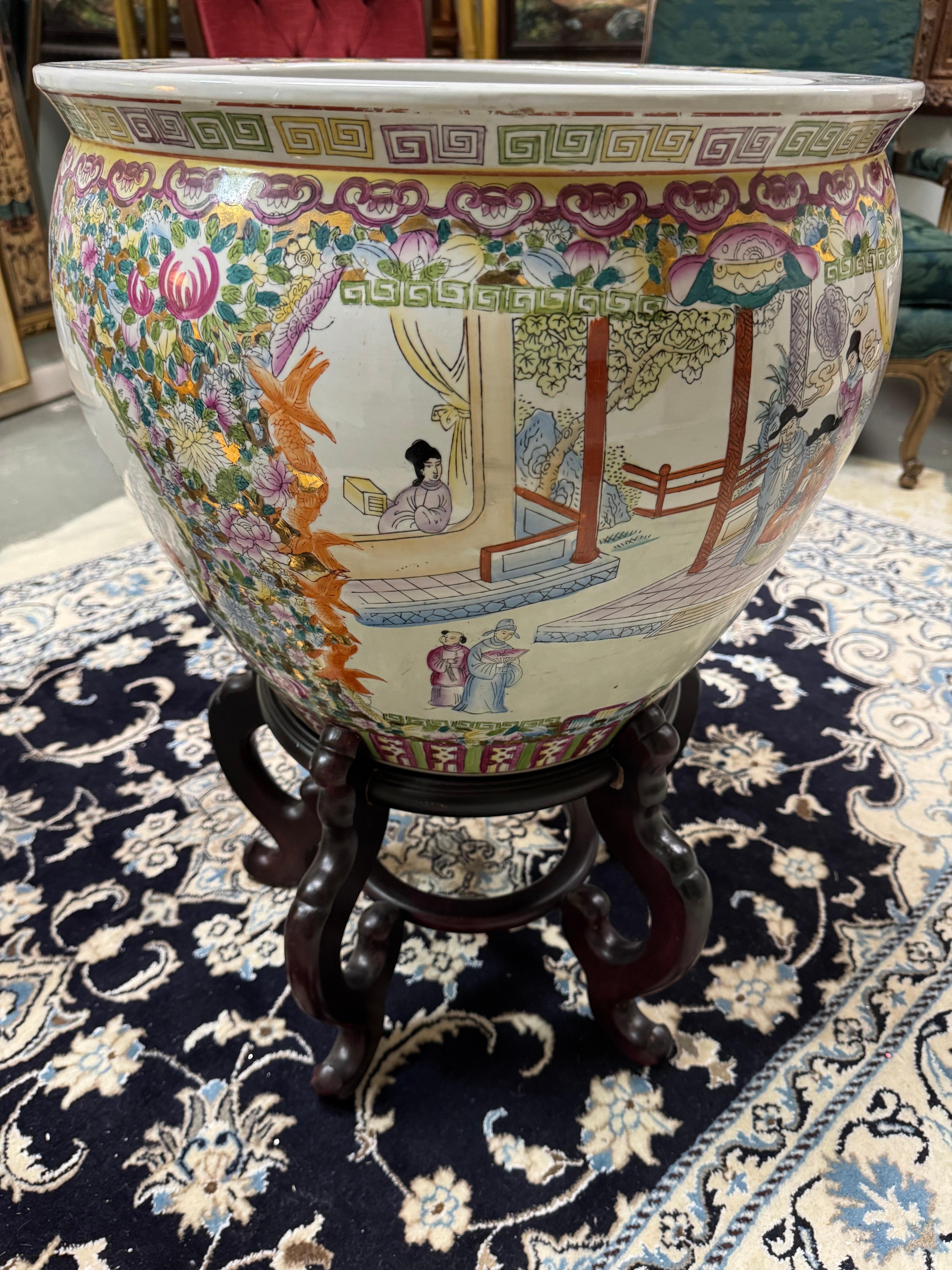 Vintage Chinese Famille Rose Porcelain fish bowl with wooden stand In Good Condition In Birmingham, AL