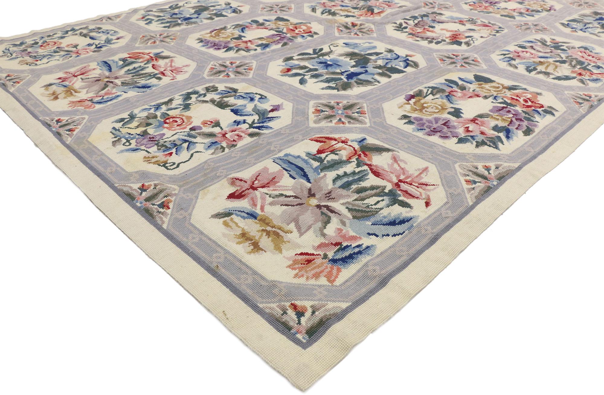 77206 vintage Chinese floral needlepoint rug with French Country style. Various flower species grace the windows of an all-over compartment style lattice pattern in this vintage Chinese floral needlepoint rug with French Country style. Disarming and