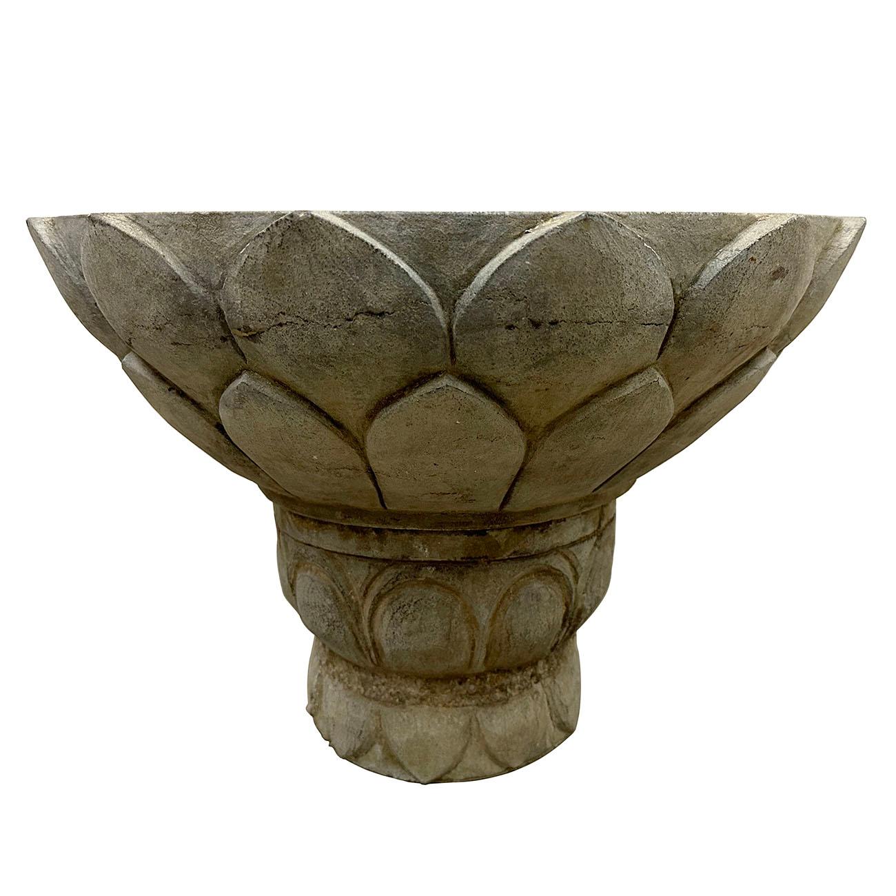 This stone planter is retrieved from the village in northern part of China. It is hand chiseled out of solid stone and hand carved by the local stone master. It come with 2 pieces and set them together for planter. It has lotus flower carvings on