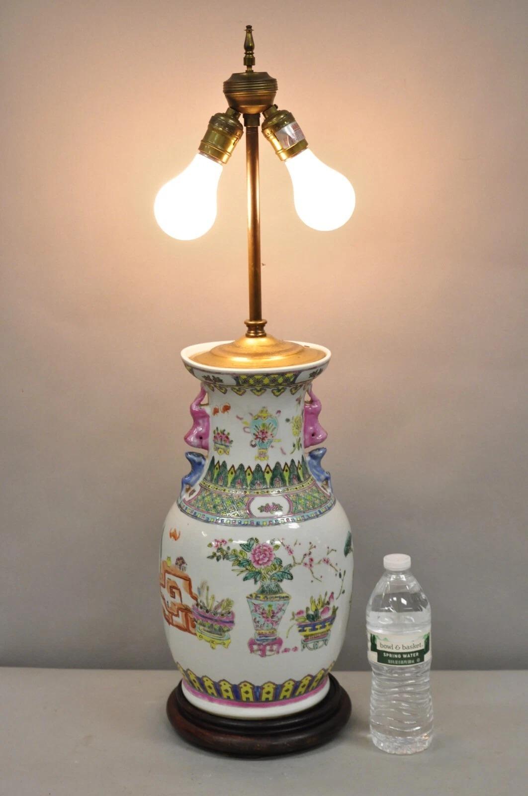 Vintage Chinese Hand Painted Porcelain Jardinierie Floral Chinoiserie Table Lamp with Dimmer Switch. Circa Mid 20th Century. Measurements: 29