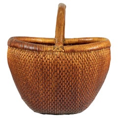 Vintage Chinese Handwoven Rattan Carrying Basket with Arched Handle