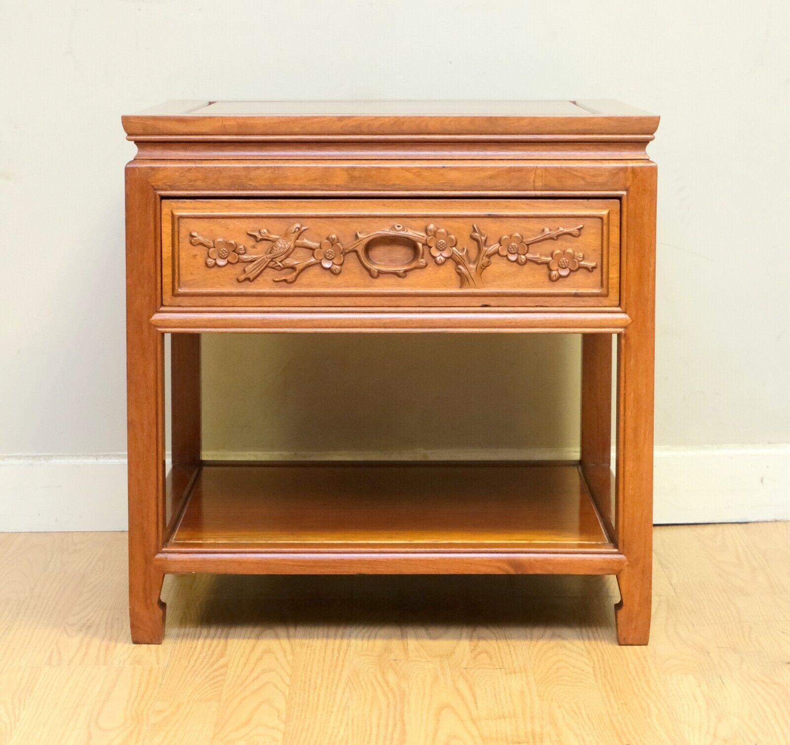 We are delighted to offer for sale this vintage Chinese hardwood side table with a single drawer and tier. 

This well made table is ideal to be used as a side or end table as it can be combined with any style. The item presents a deep and good