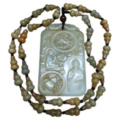 Ciondolo di Buddha intagliato in giada Hetian cinese vintage con collana di perle di zucca