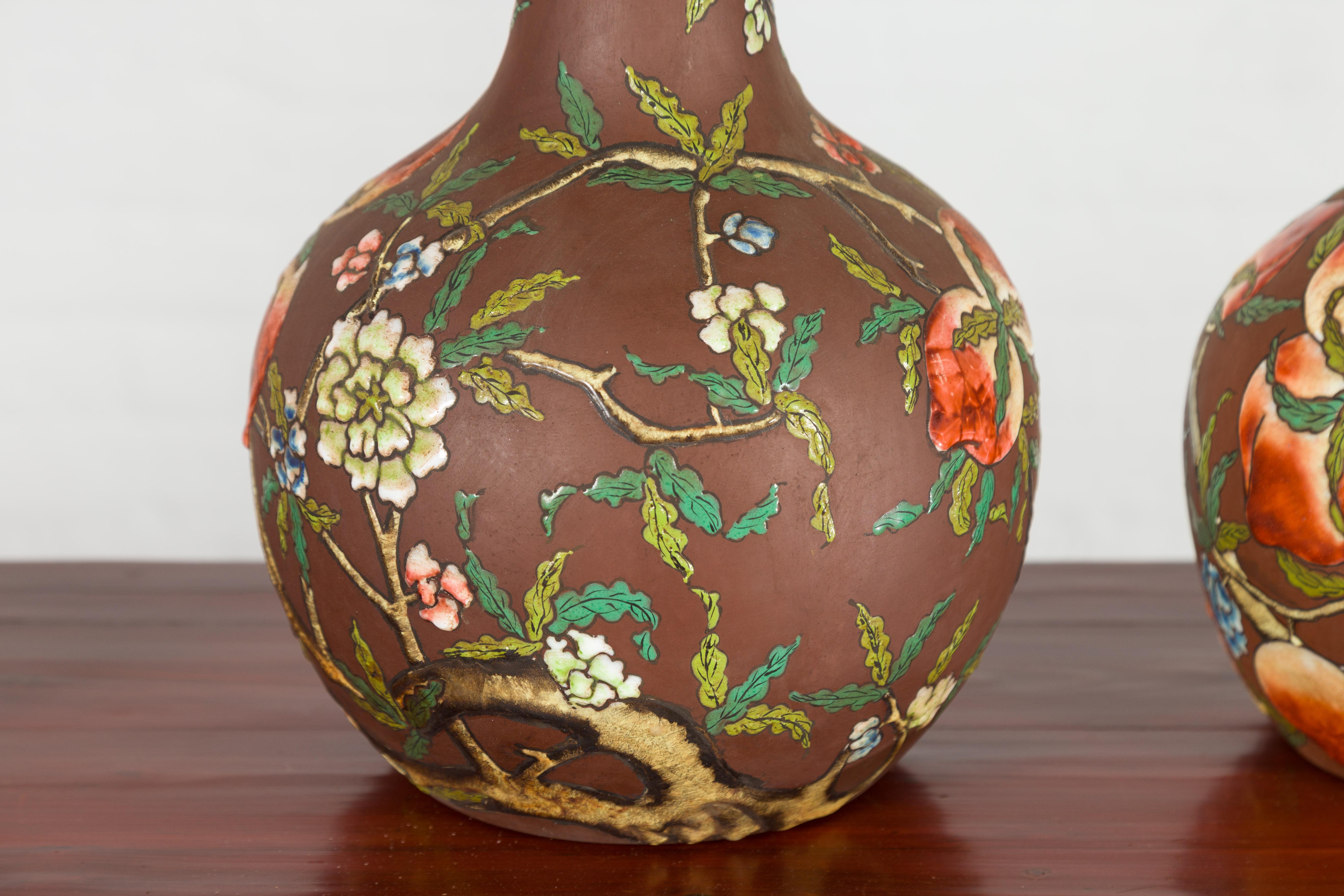 Vintage Chinese Kendi Shape Porcelain Vases with Raised Floral and Fruit Décor For Sale 6