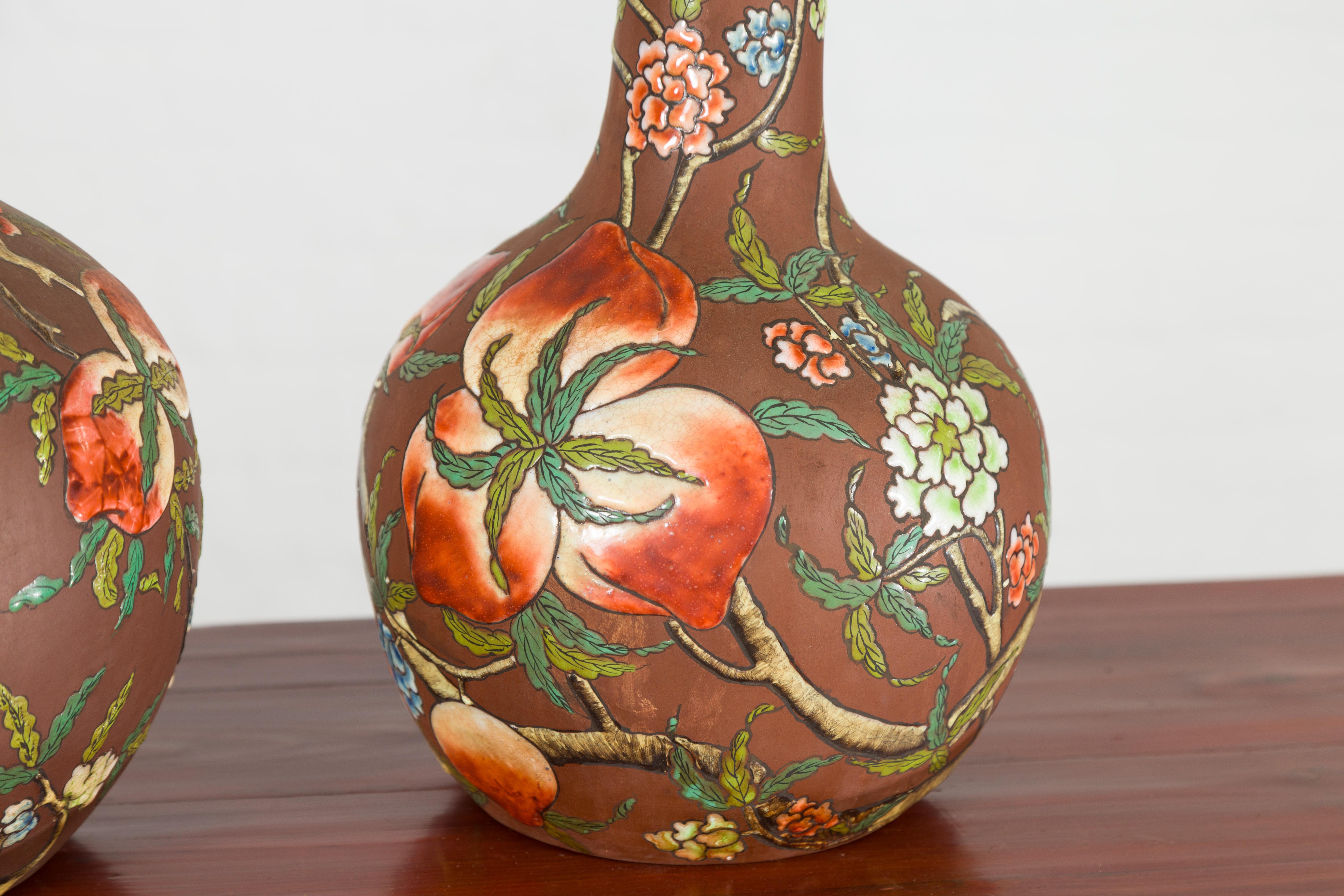 Vintage Chinese Kendi Shape Porcelain Vases with Raised Floral and Fruit Décor For Sale 7