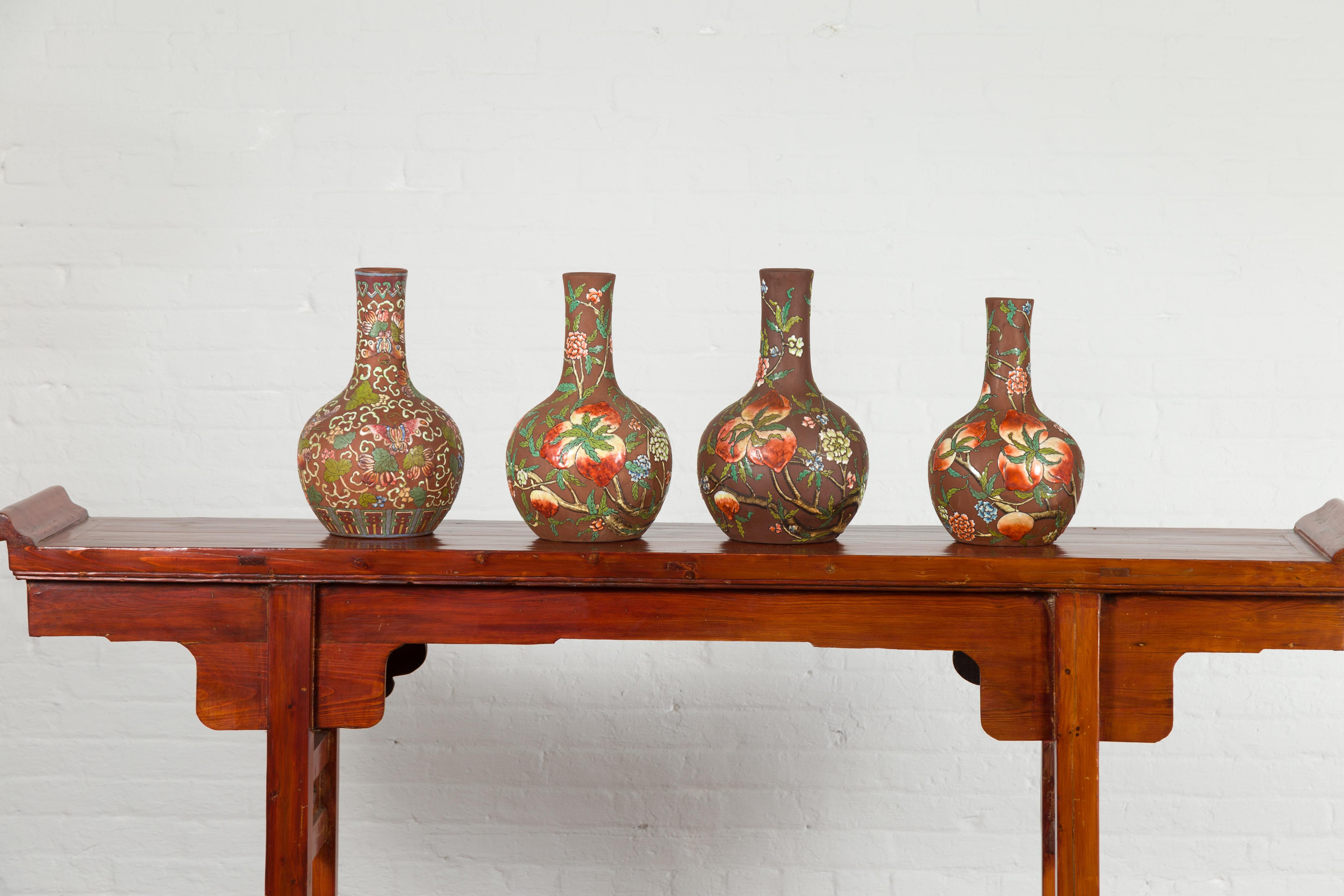 Hand-Crafted Vintage Chinese Kendi Shape Porcelain Vases with Raised Floral and Fruit Décor For Sale