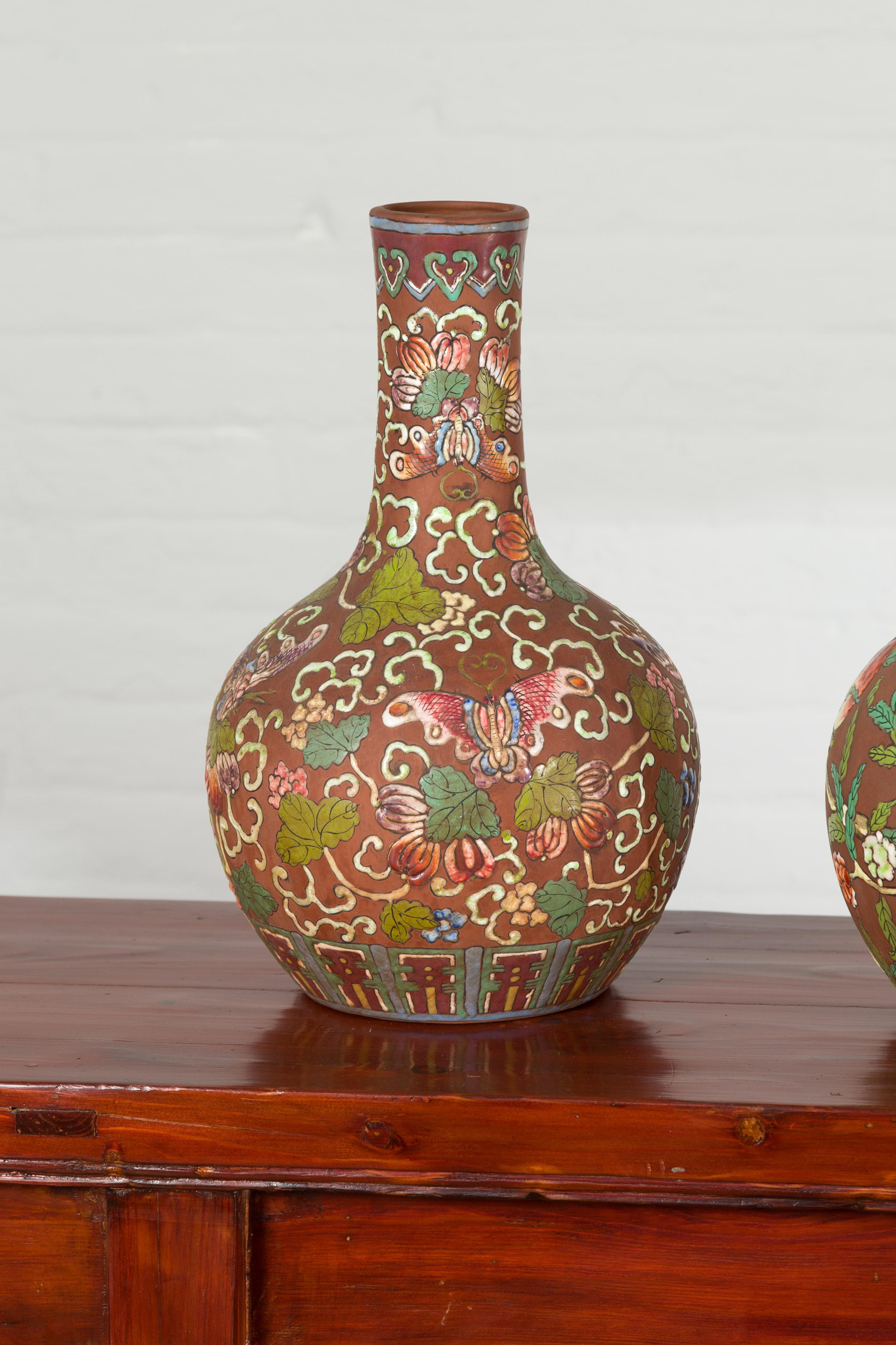 20th Century Vintage Chinese Kendi Shape Porcelain Vases with Raised Floral and Fruit Décor For Sale