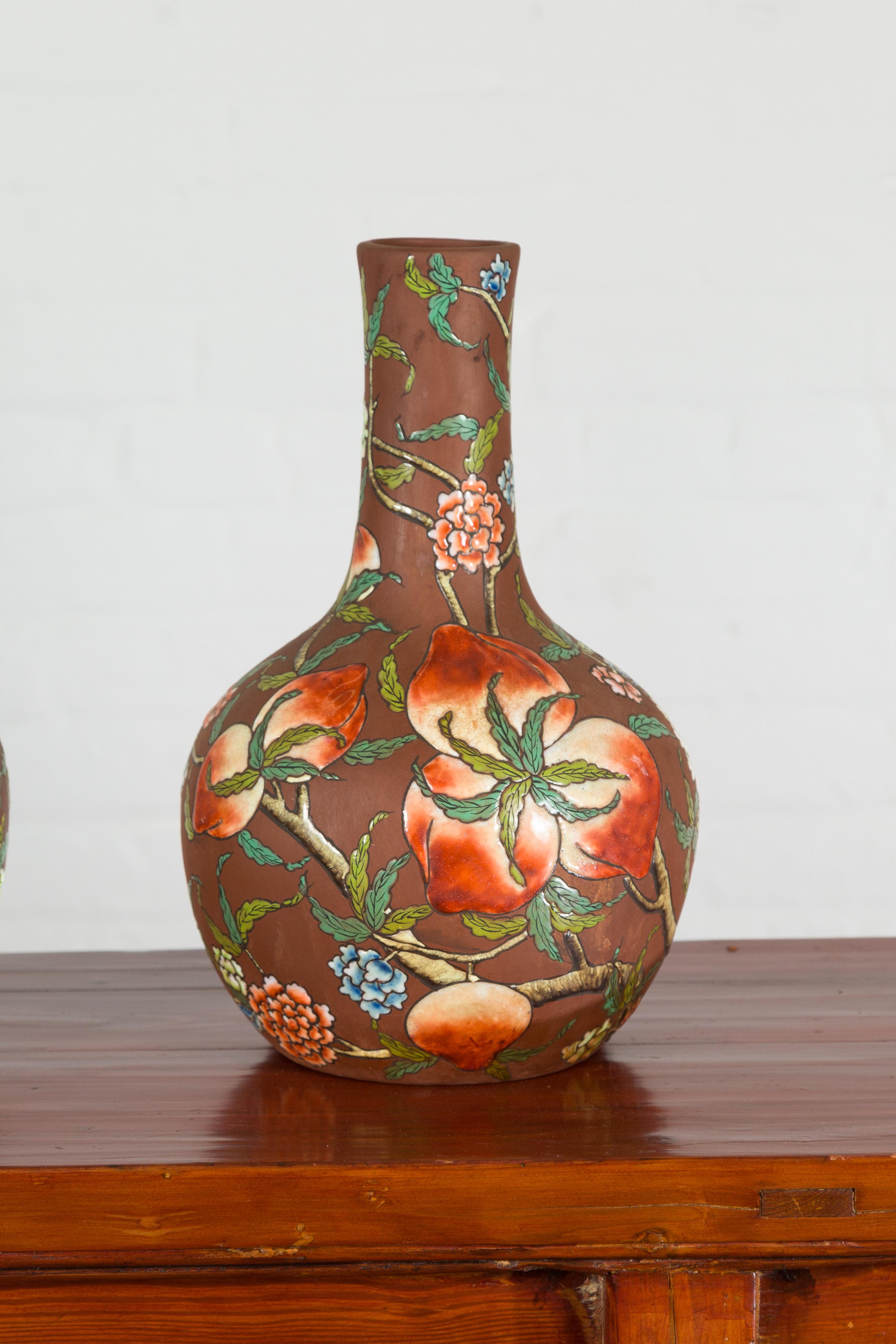 Vintage Chinese Kendi Shape Porcelain Vases with Raised Floral and Fruit Décor For Sale 1