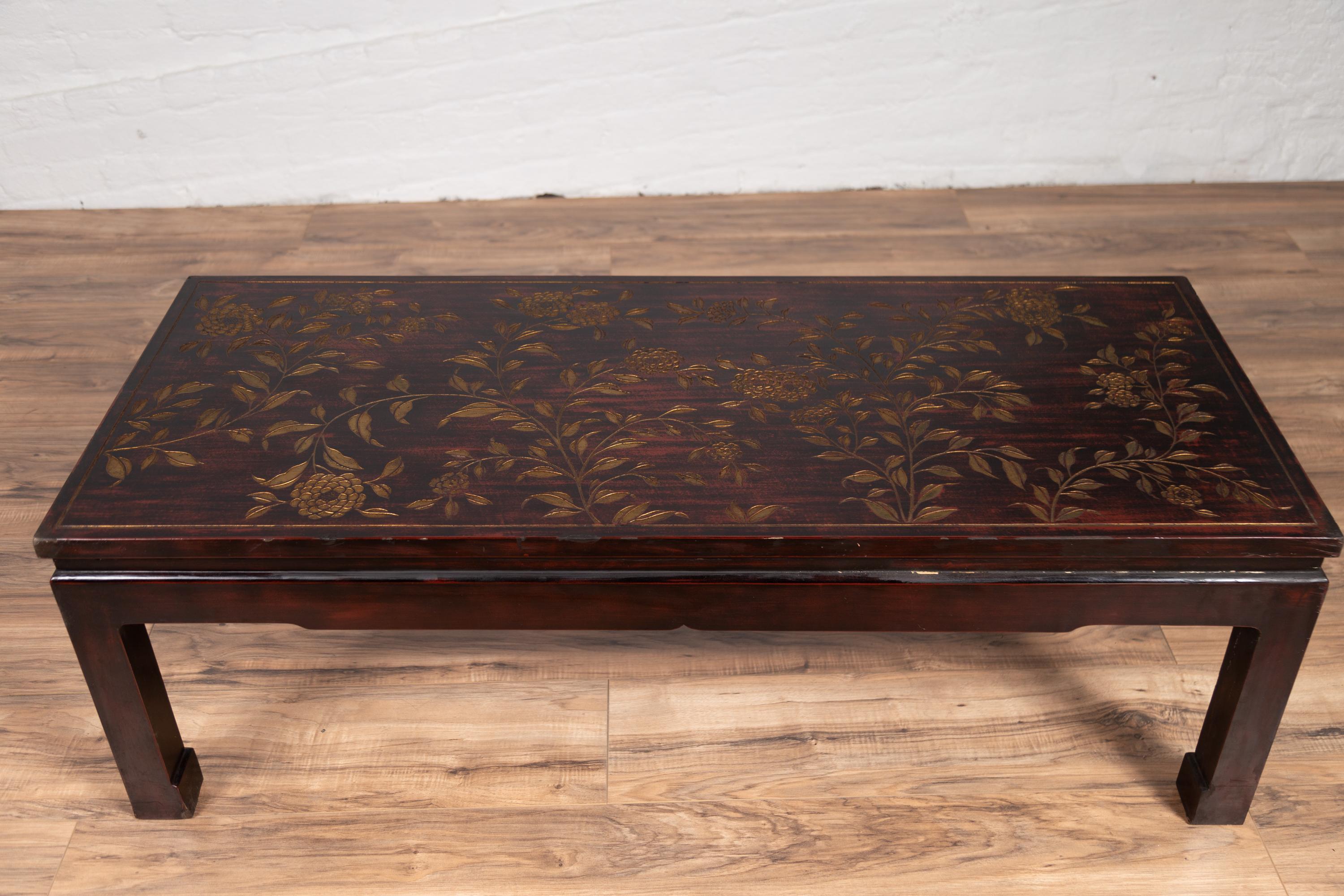 Wood Vintage Chinese Lacquered Coffee Table with Carved and Gilt Floral Décor For Sale