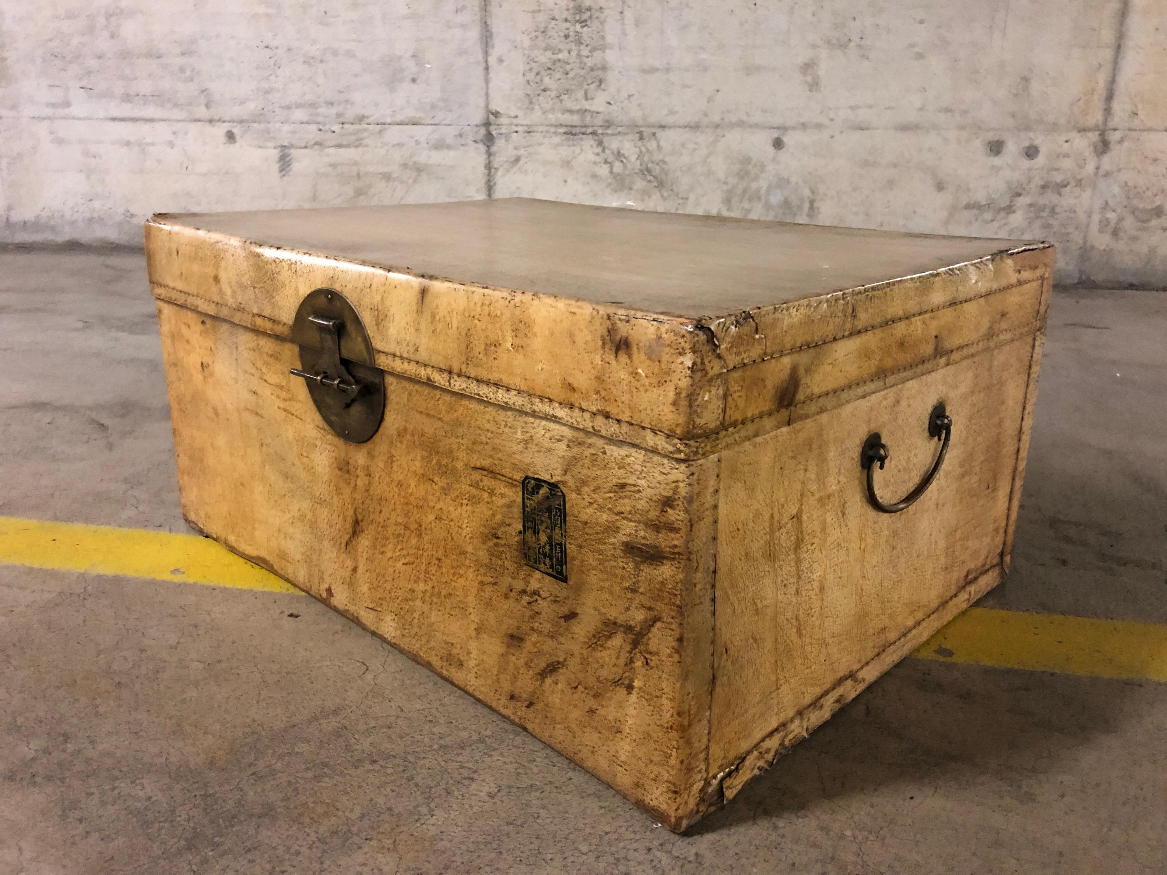 Large trunk with Chinese stamp, side handles 41cm H x 84cm x 59cm.
 