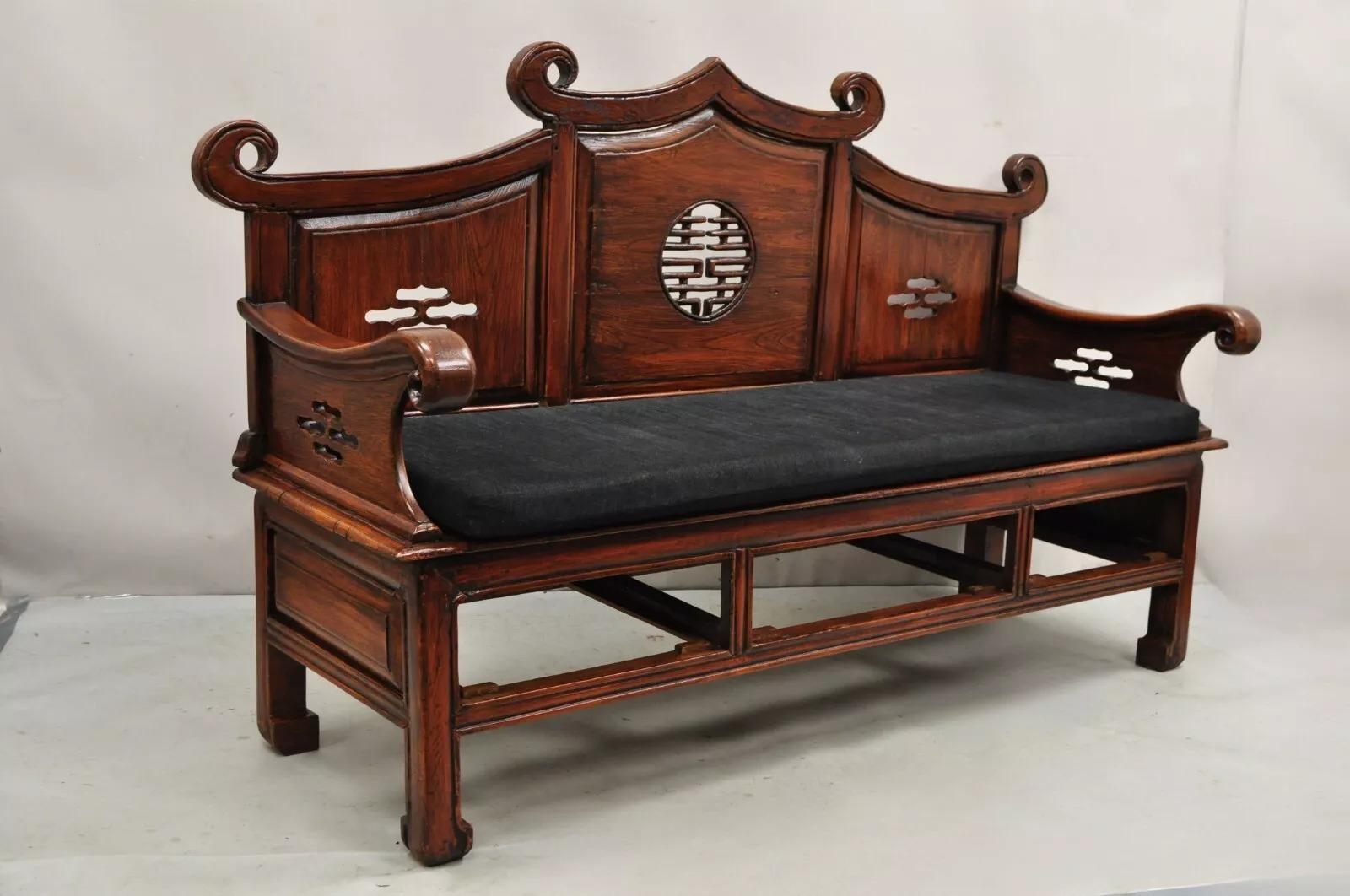 Vintage Chinese Mahogany Carved Wood Pagoda Sofa Hall Wedding Bench. Circa Mid 20th Century. Measurements: 46