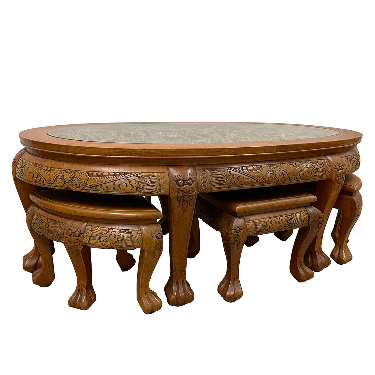 This beautiful teak wood coffee table has a lot of Chinese traditional massive carving works of Chinese beauties design on the top. This coffee table made from solid teak wood and has beautiful ornate carving works on the top and side. It come with