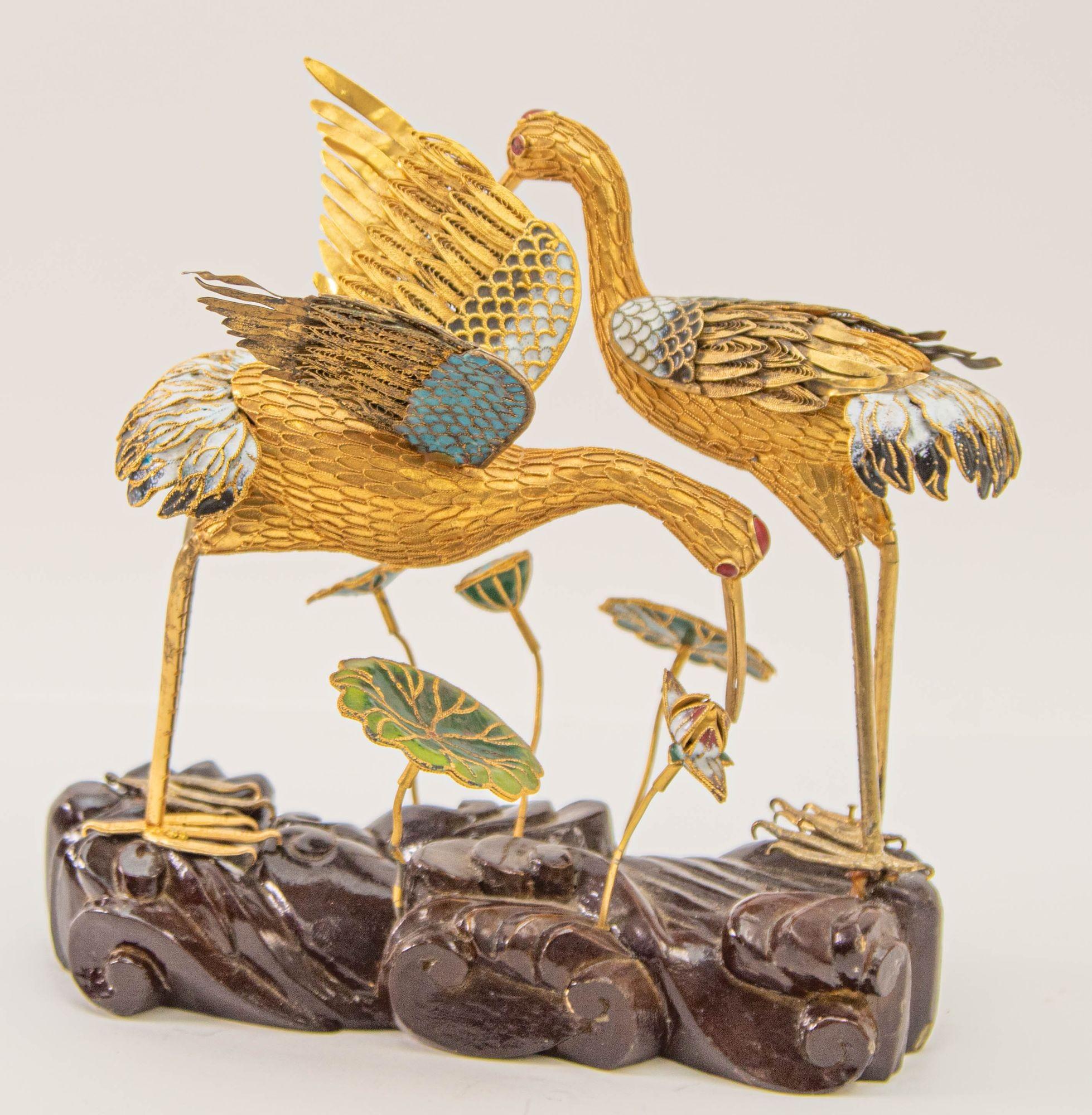 Hand-Crafted Vintage Chinese Metal Gilt Filigree and Enamel Cranes Figures on Wooden Stand For Sale
