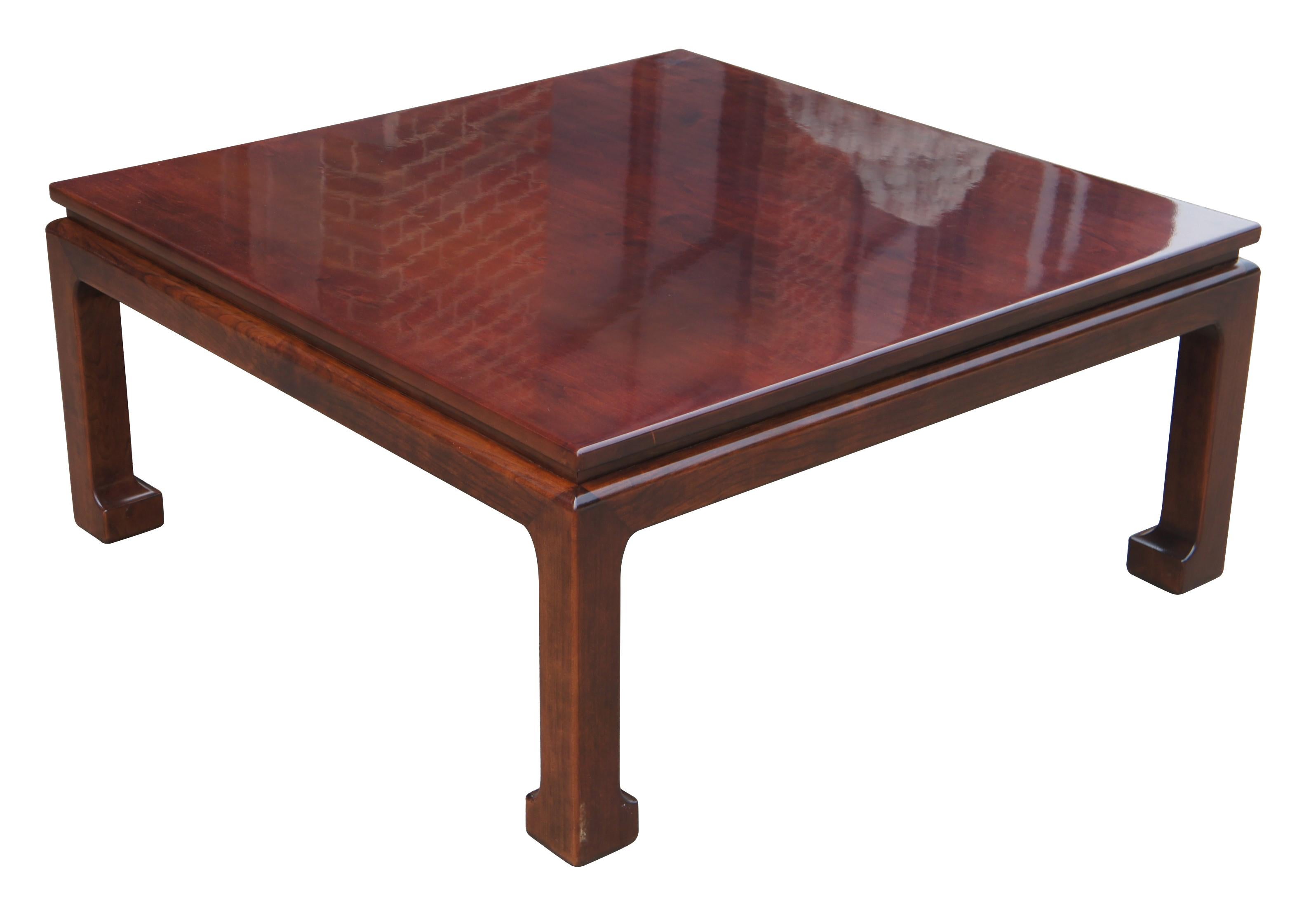 A beautiful Chinoiserie coffee table.  Made from rosewood in classic Ming form with a square top over straight legs with inward flared feet.  Brass plate along underside Marked NW.

Dimensions:
42