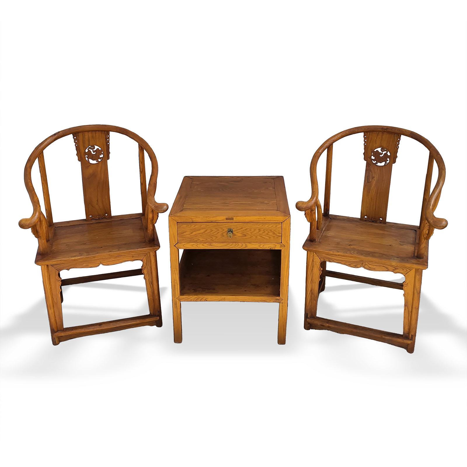 Vintage Chinese Ming Style Natural Wood Horseshoe Pair of Armchairs and Table.
Dimensions: 
Armchairs 68x68x107cm
Table 60x60x74cm
Good overall condition, normal wear according to their age.

A pair of wood horseshoe back armchairs from the mid 20th