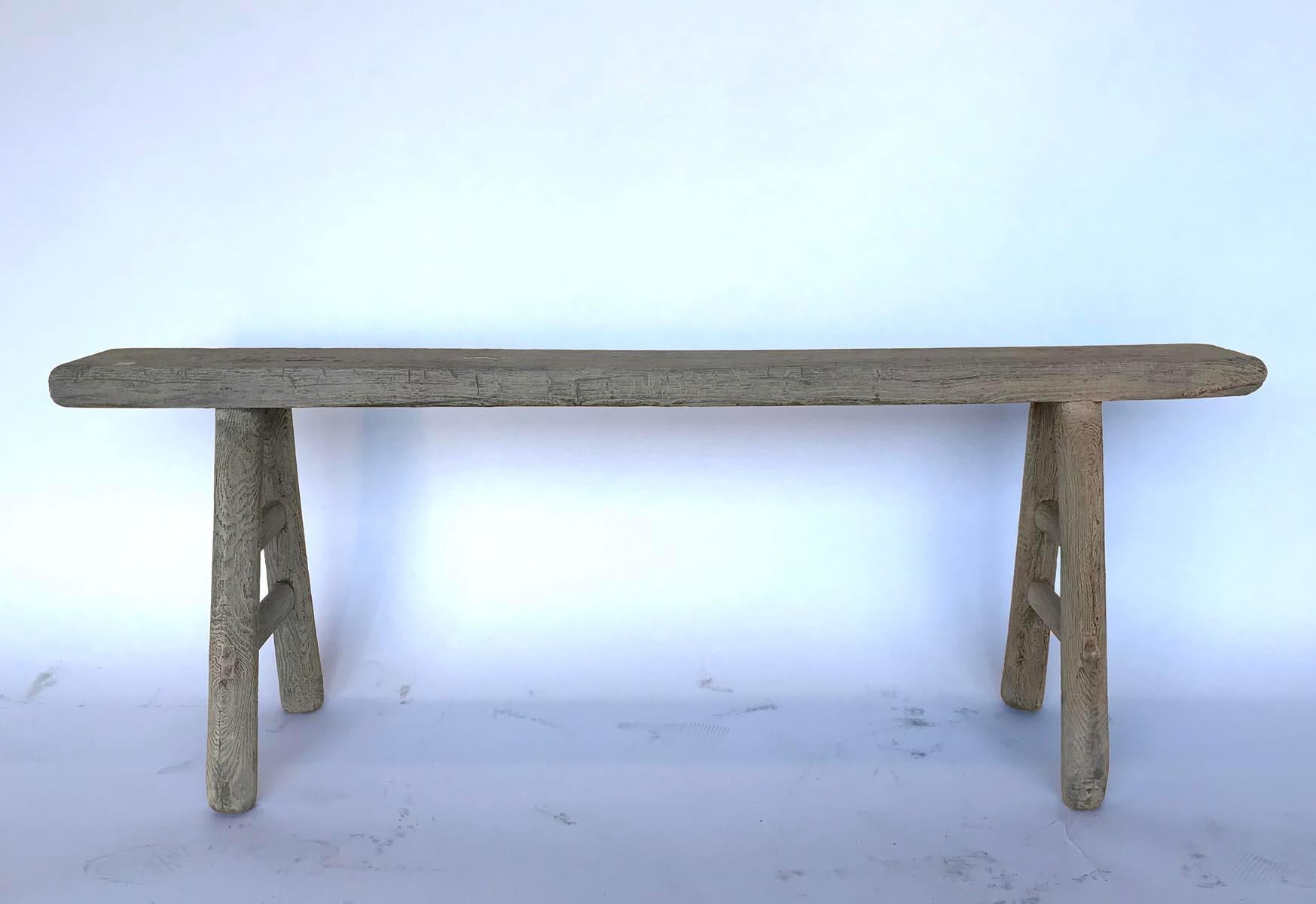 Very old bench with weathered wood and nice patina. Narrow seat of 6.5 inches. Low profile. Sturdy. Fits almost anywhere! We have four other similar benches.