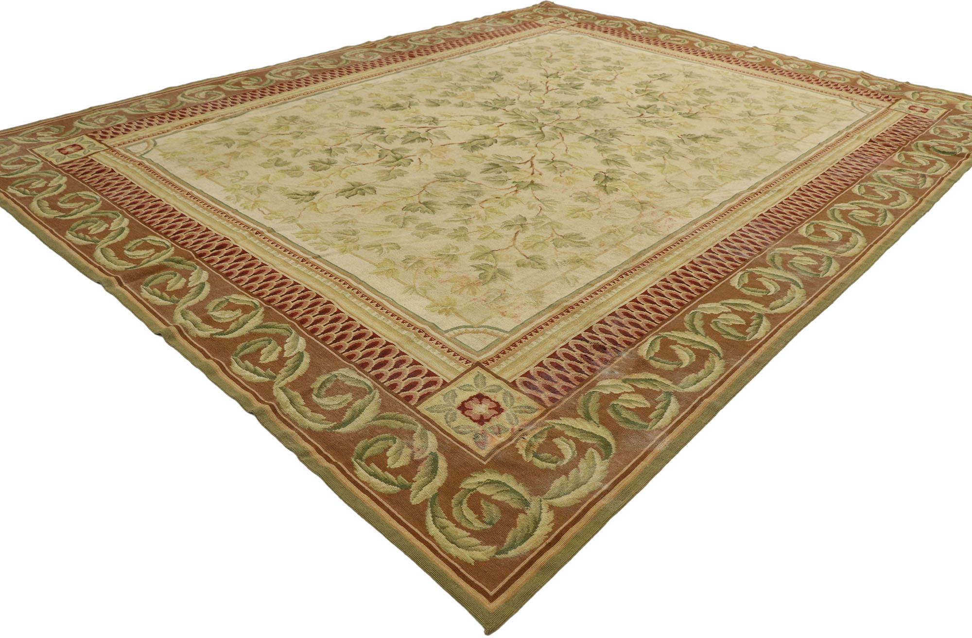 77523, vintage Chinese needlepoint Aubusson style rug with English Cottage style. Balancing a timeless design with traditional sensibility, this hand-woven wool vintage Chinese needlepoint rug beautifully embodies English Cottage style. The abrashed