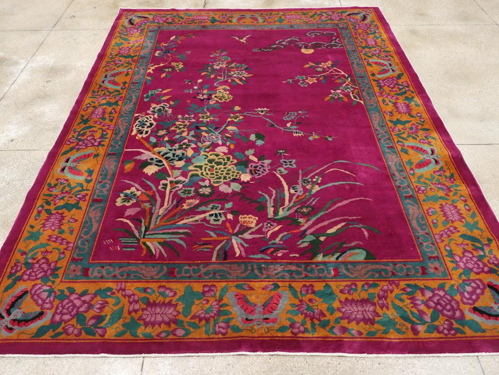This exquisite Mid-20th century Chinese Nickles Art Deco rug, measuring 8' 10