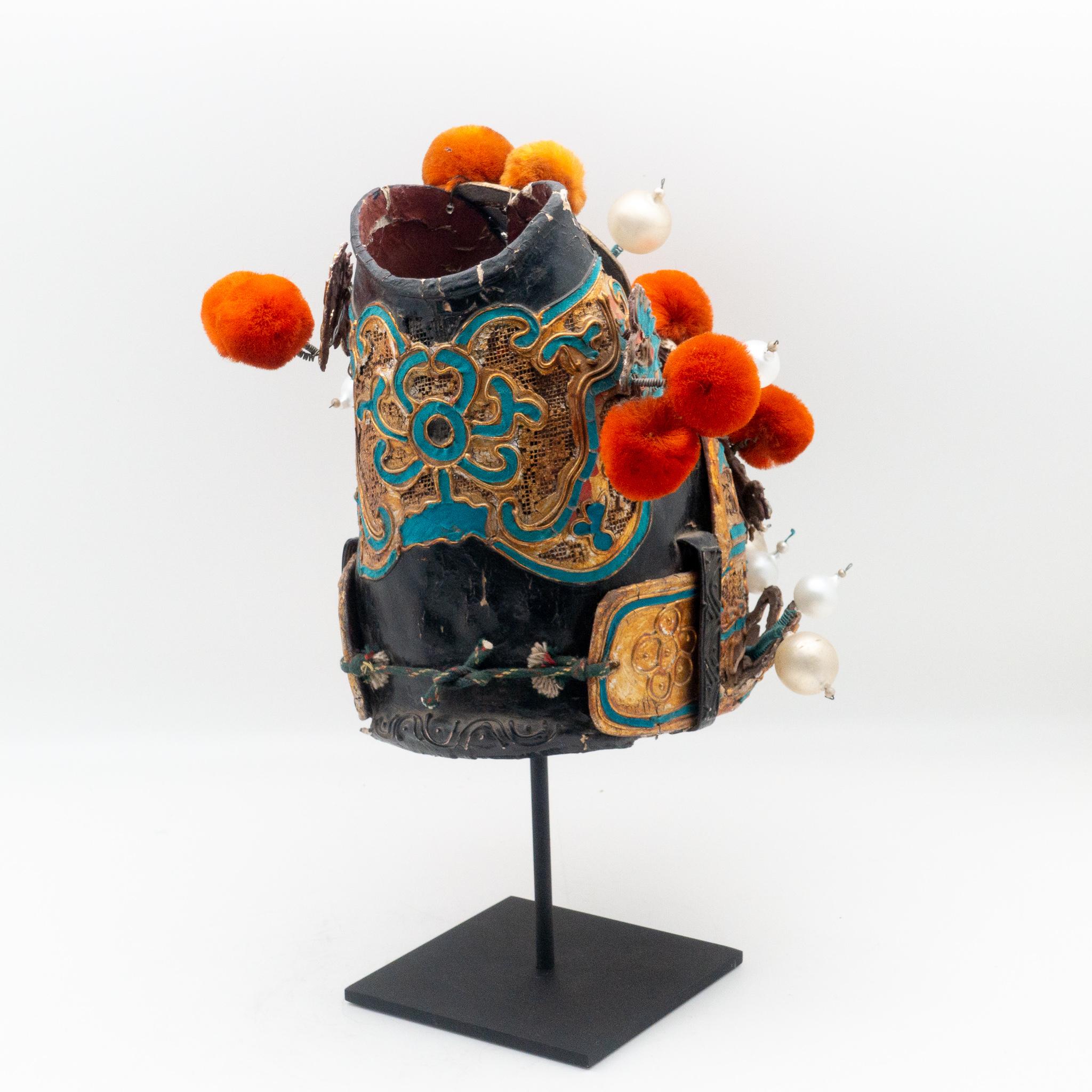 Vintage Chinese opera theatre headdress, early 20th century, mounted on a custom, black painted metal base. 

 