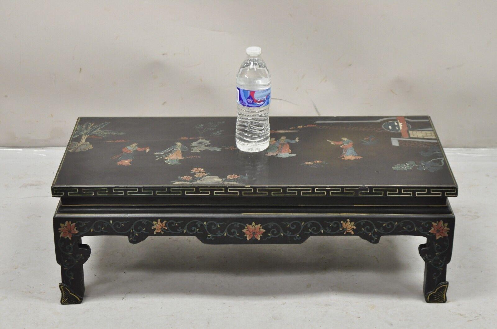 Vintage Chinese Oriental Black Lacquer Hand Painted Low Asian Side Table. Item features nice low form, carved and hand painted scenes with women, very nice vintage item. Circa Mid 20th Century. Measurements: 9.5