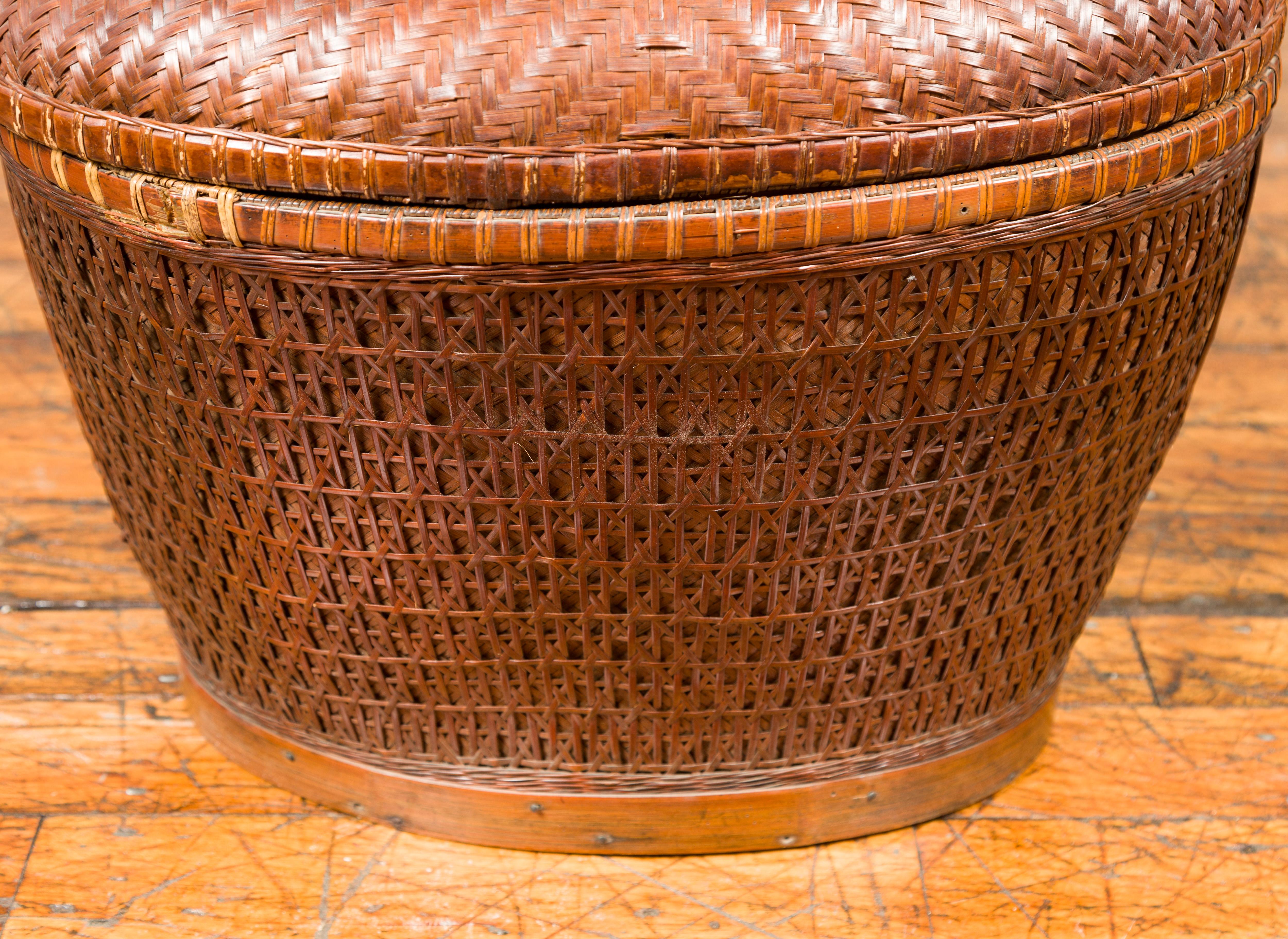Vintage Chinese Oval Woven Rattan Basket with Lid and Geometric Motifs In Good Condition For Sale In Yonkers, NY