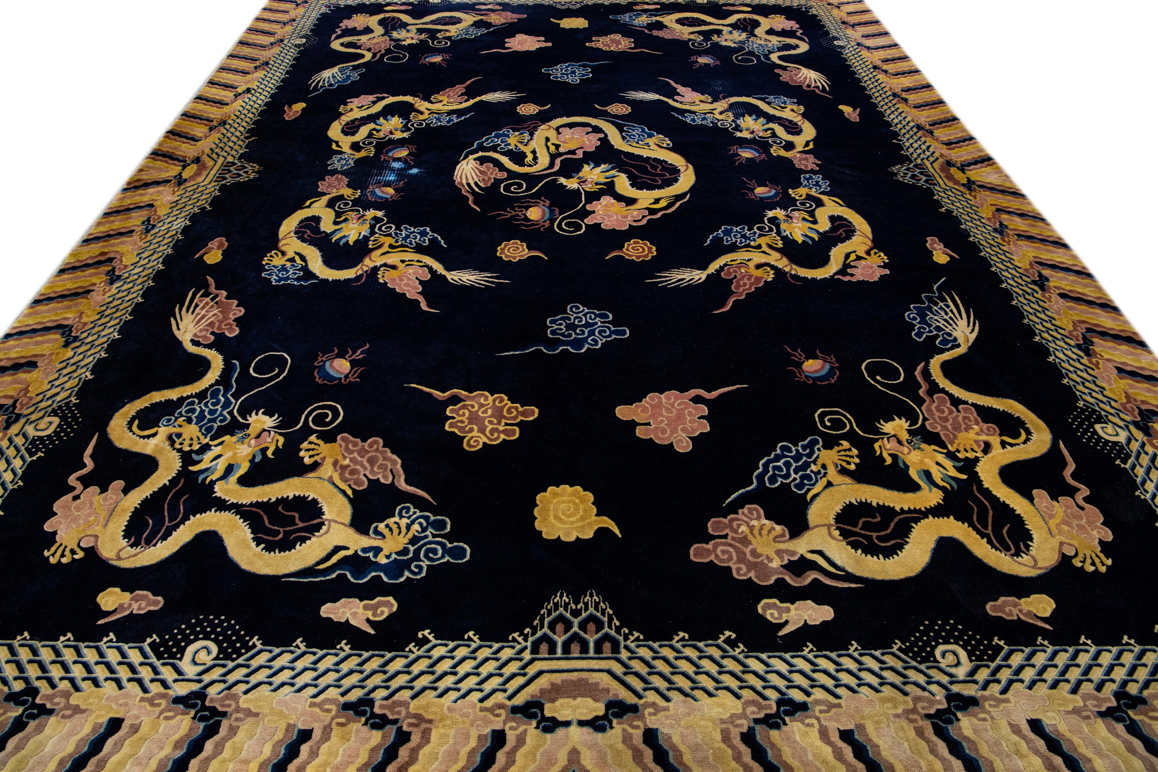Hand-Knotted Vintage Chinese Peking Handmade Dragon Designed Dark Blue Wool Rug For Sale