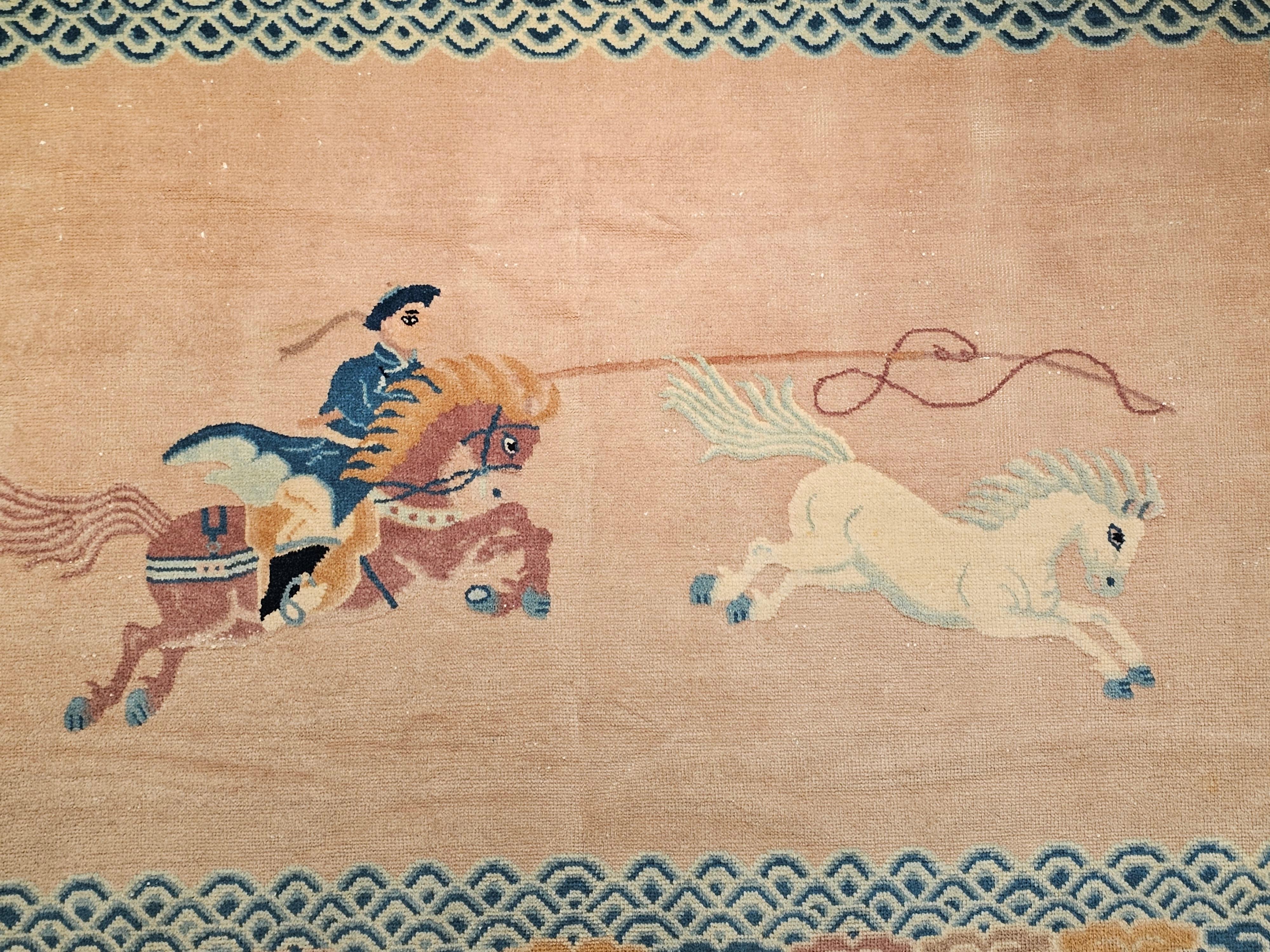 Hand-Woven Vintage Chinese Pictorial Rug of a Riding Horseman in Pale Peach/Pink, Baby Blue For Sale
