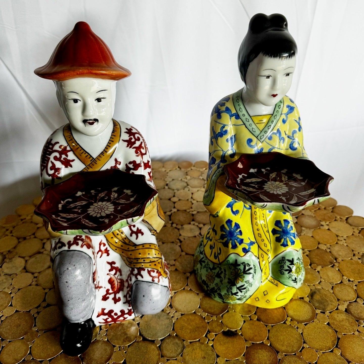 Set of two vintage Chinese porcelain servant sculptures, hand-painted with vibrant colors and intricate detailing, perfect for any collection.
 
 We sell items as acquired, without restoring or repairing. Vintage pieces may have age-related wear.