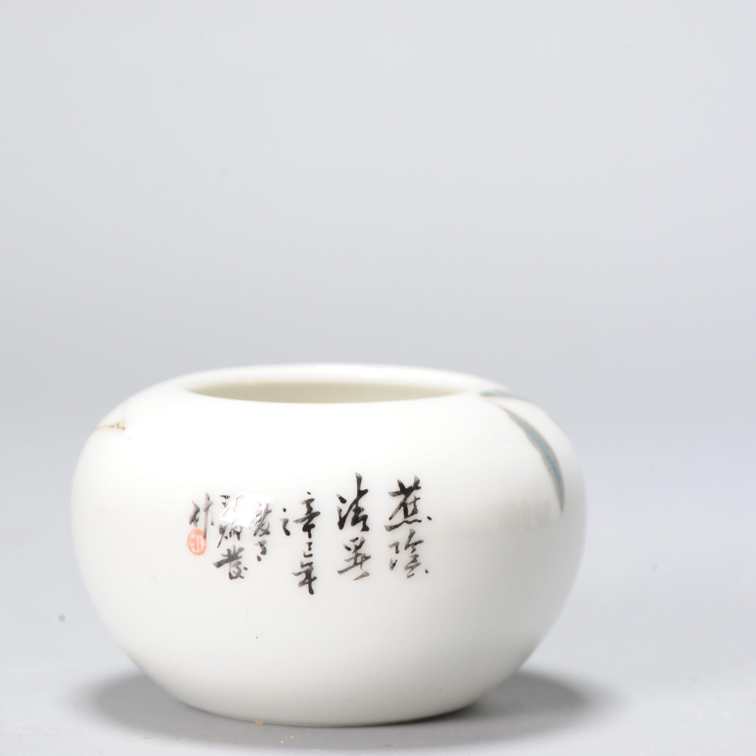 Lovely Chinese porcelain water pot of small size. With an unusual scene of a spider web in a garden. Also calligraphy. Dating to the 1980's or 90's. Marked at base.

Additional information:
Material: Porcelain & Pottery
Region of Origin: