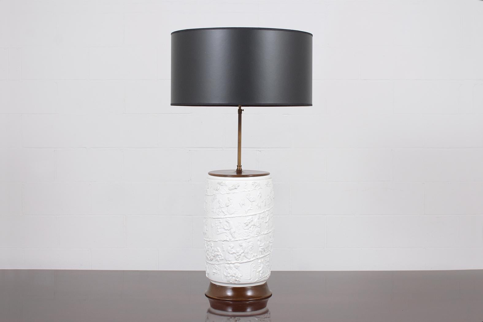 Step into an era of unmatched sophistication with our vintage Chinese table lamp, a work of art meticulously crafted from premium porcelain. Radiating timeless elegance, this lamp stands in great condition and has been updated with new wiring,