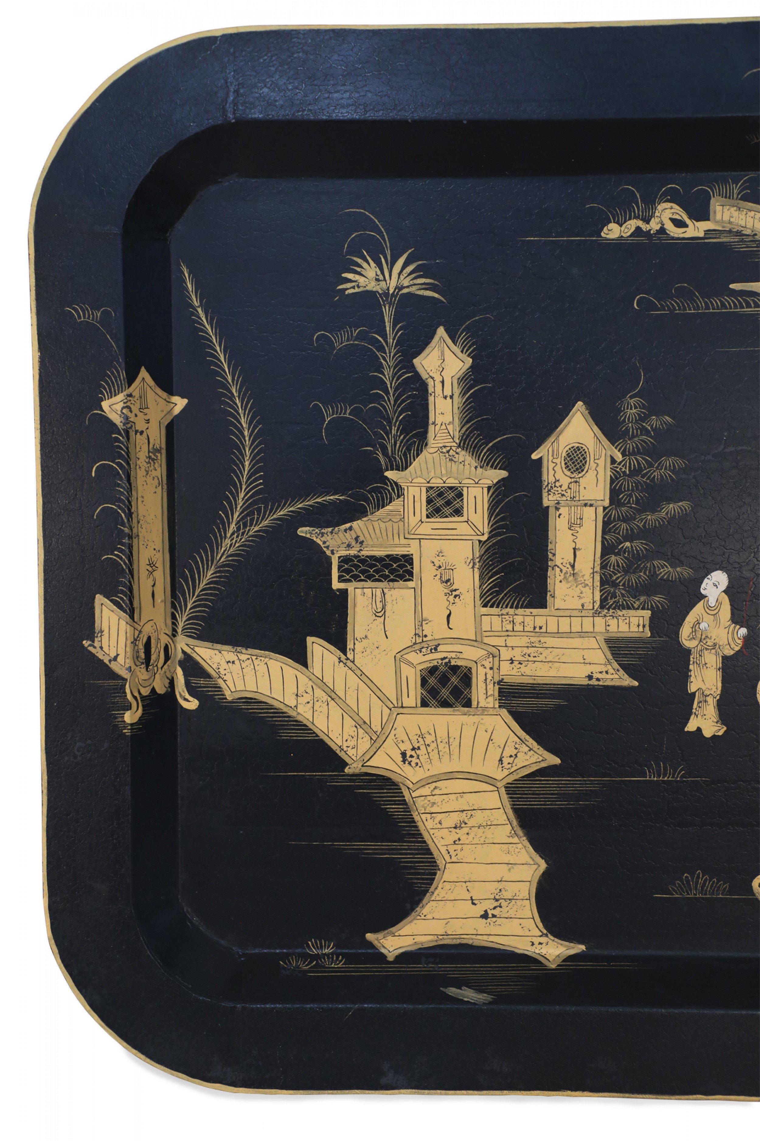 Vintage Chinese rectangular tole serving tray with a painted gold design of a figures in a monestary courtyard on a black background surrounded by a shallow lip with rounded corners.
   