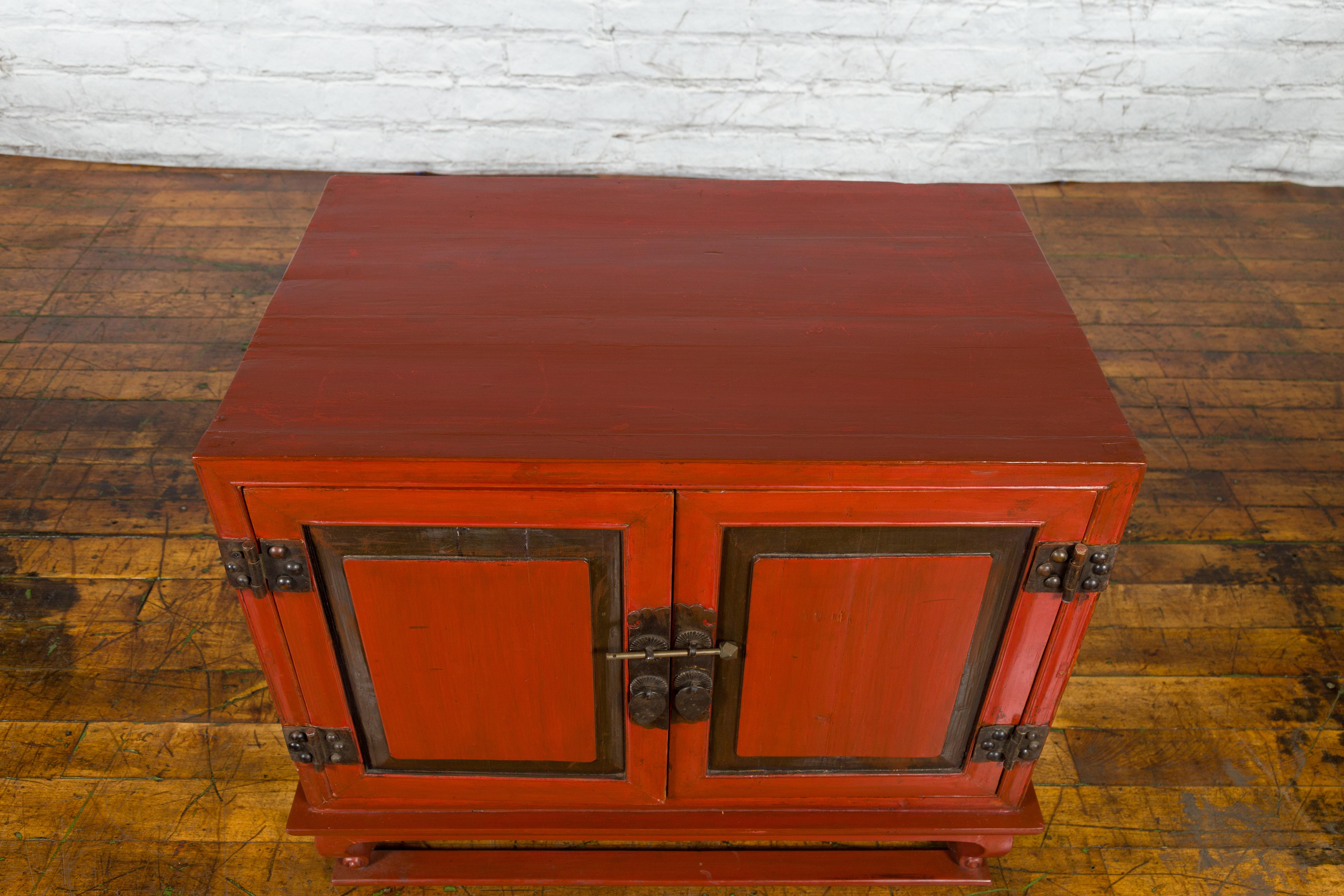 Brass Vintage Chinese Red Lacquer Small Cabinet with Dark Accents and Cabriole Legs For Sale