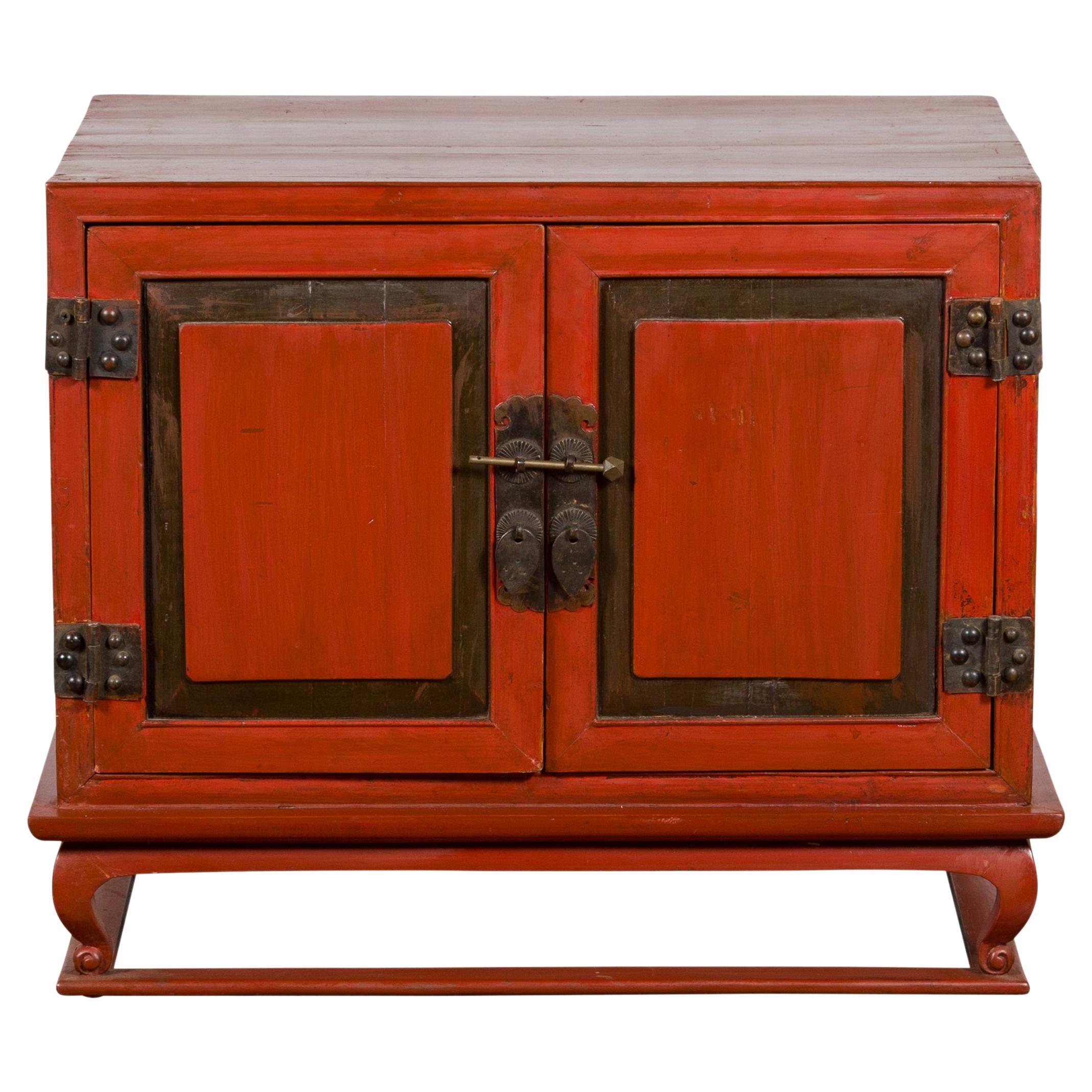Vintage Chinese Red Lacquer Small Cabinet with Dark Accents and Cabriole Legs For Sale