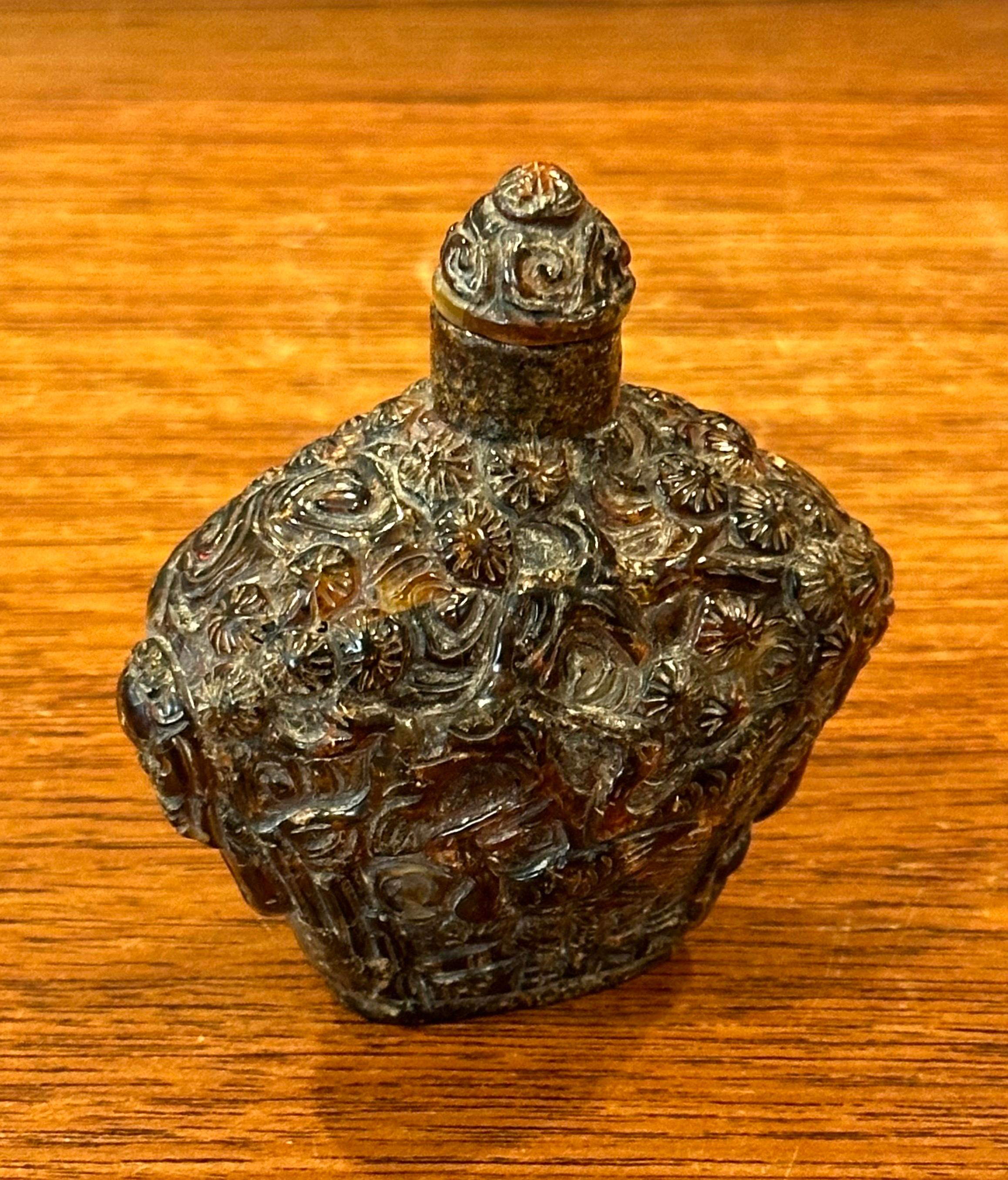 Carved Vintage Chinese Relief Amber Snuff Bottle For Sale
