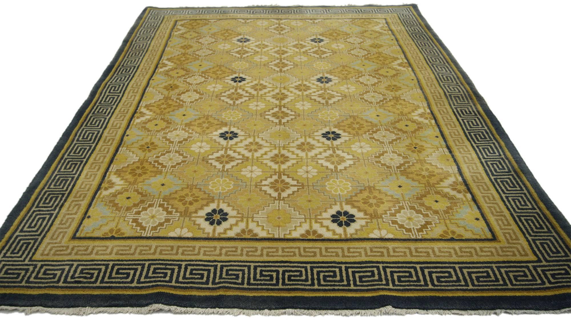 77137, vintage Chinese rug with modern style. This hand-knotted wool vintage Chinese rug with modern style features an all-over geometric pattern surrounded by a double Greek Key Meandering border. The meandering border (Greek Key) symbolizes