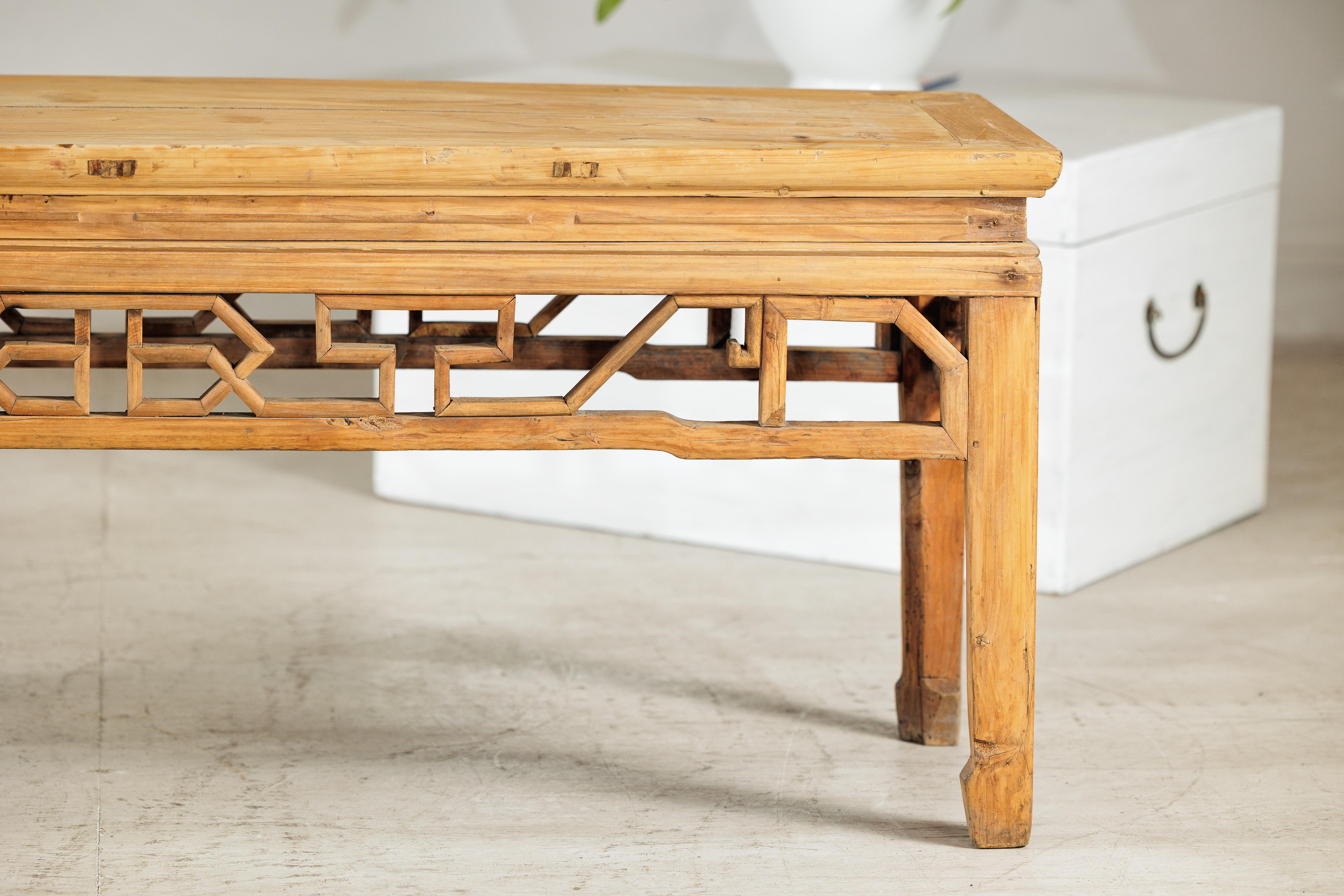 Vintage Chinese Rustic Low Table with Geometric Carved Fretwork Apron For Sale 1