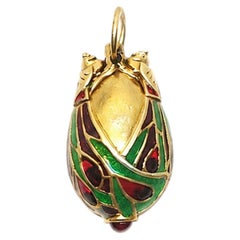 Vintage Chinese Gilded Silver Enamel Egg Pendant Bird with Garnet
