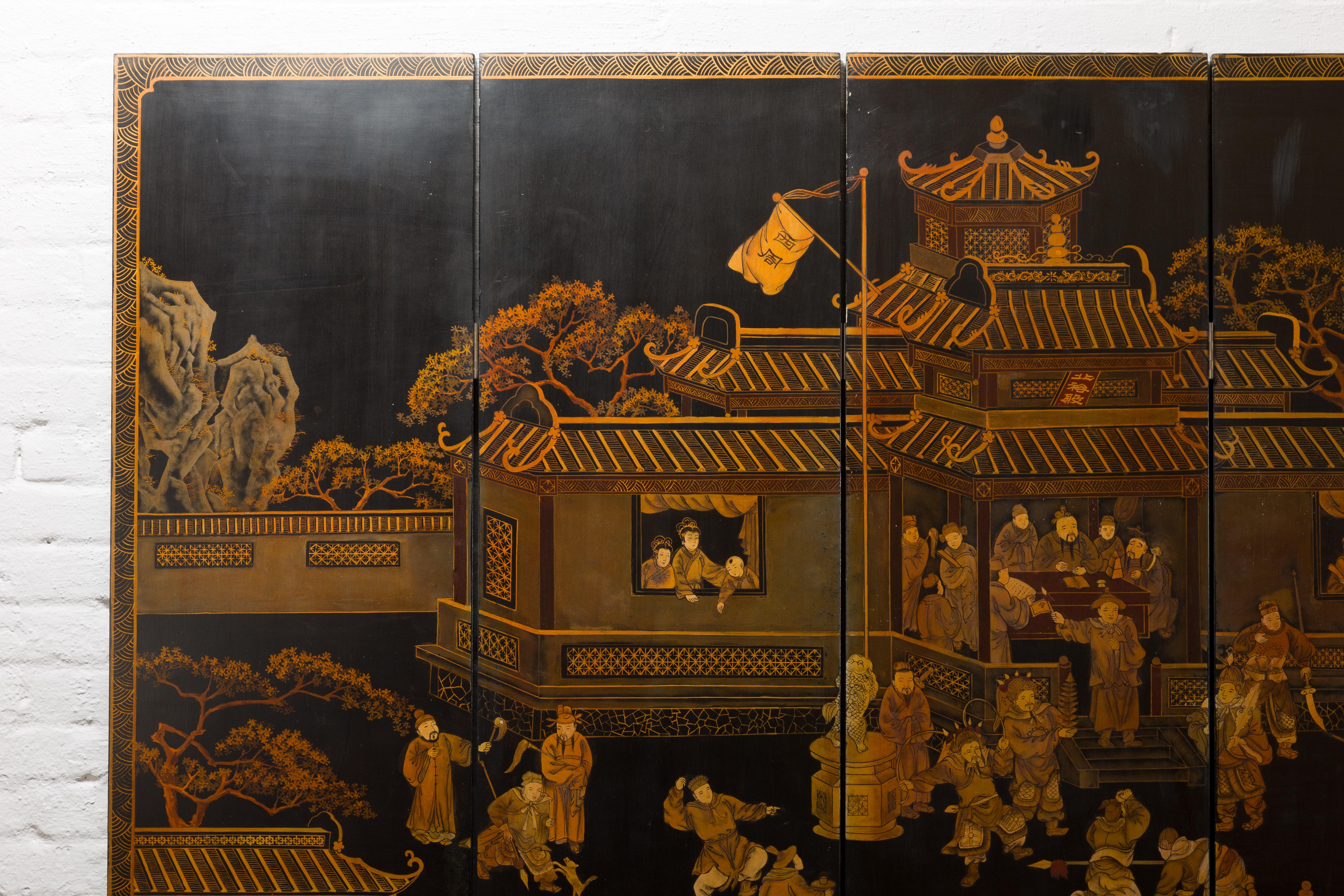 A vintage Chinese six-panel gold and black screen with hand-painted court scenes. Immerse yourself in the enchanting tales of ancient China with this alluring vintage Chinese six-panel screen. Painted in a gold color over a black lacquered ground,
