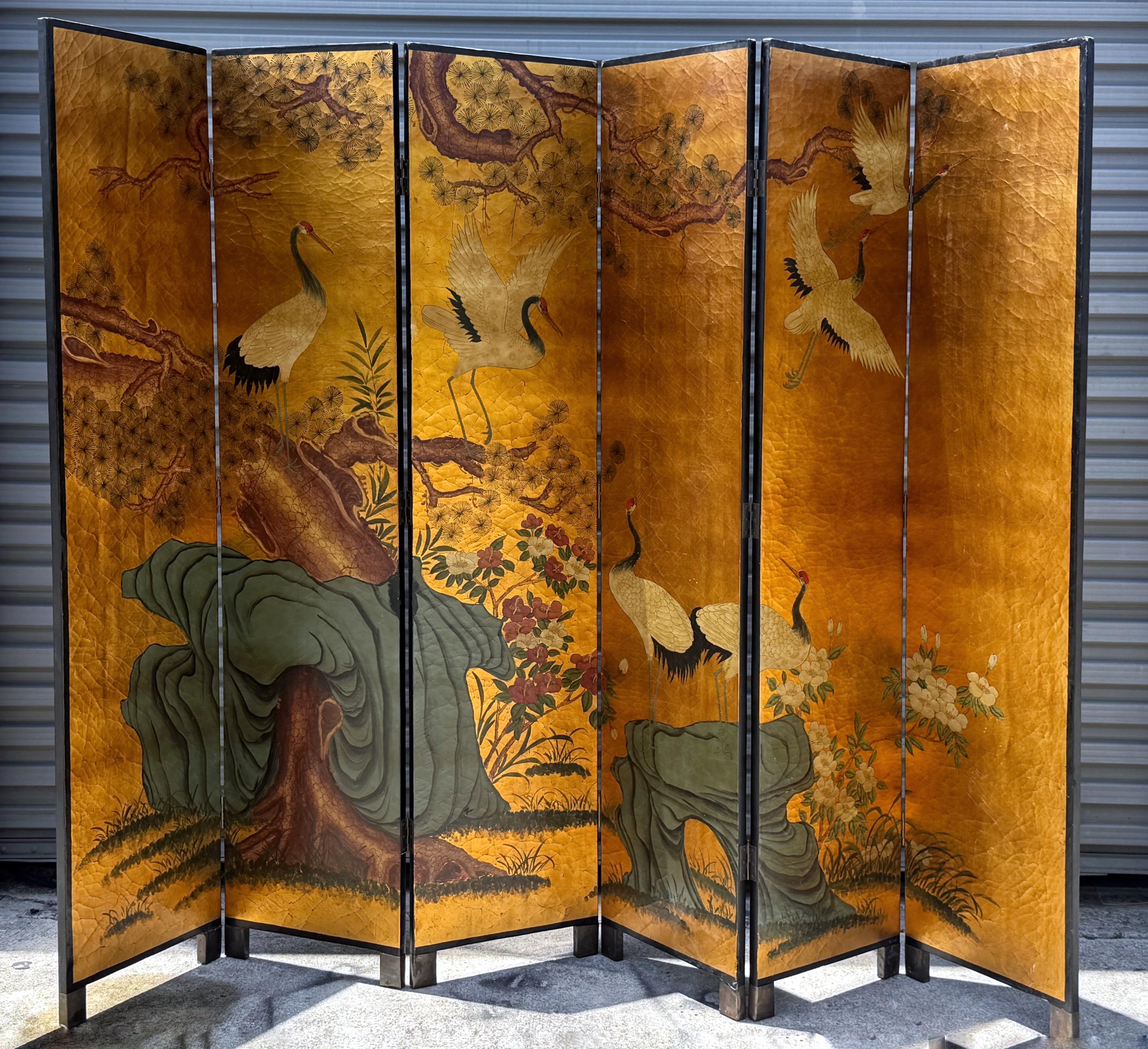 Vintage Chinese Six-Panel Screen with Cranes and Bamboo Gilt Background, C. 1980

A striking vintage Chinese six-panel folding screen, hand-painted on both sides with auspicious imagery and richly layered symbolism. Each panel measures 18 inches